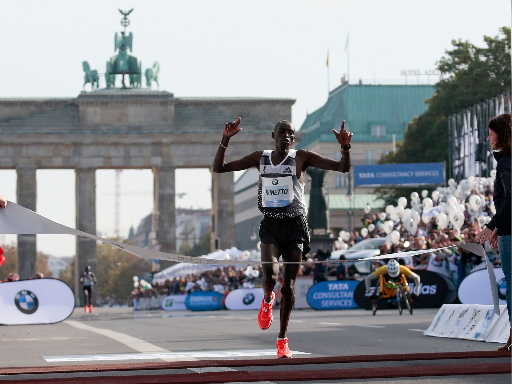 Dennis Kimetto crosses the finish line in Berlin. In the past 15 years, the world record has come down by nearly three minutes