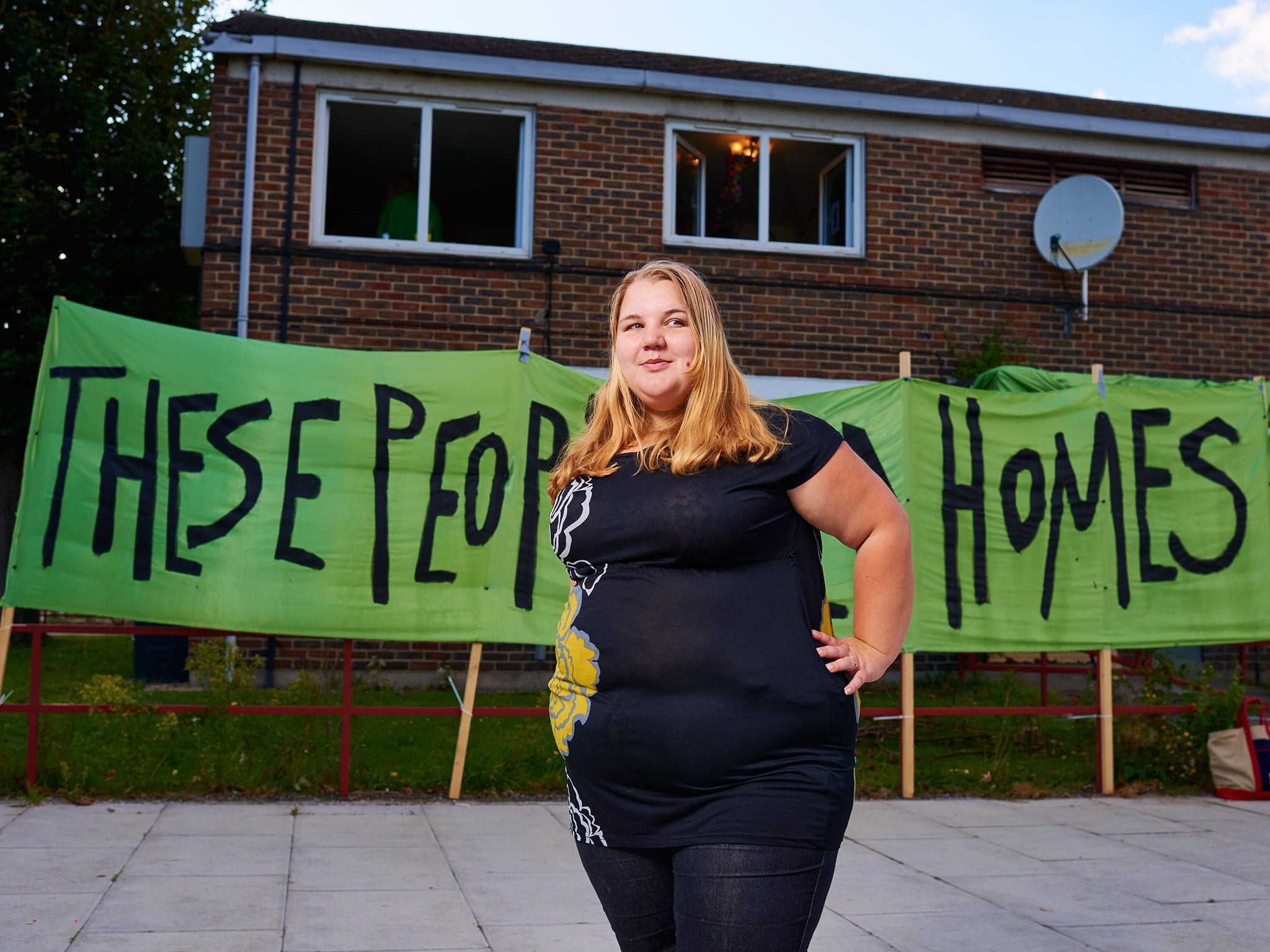Jasmine Stone is one of a group of mothers evicted from a hostel who are now resisting the local authority by taking up residence on an empty estate. The banner reads: ‘These People Need Homes’