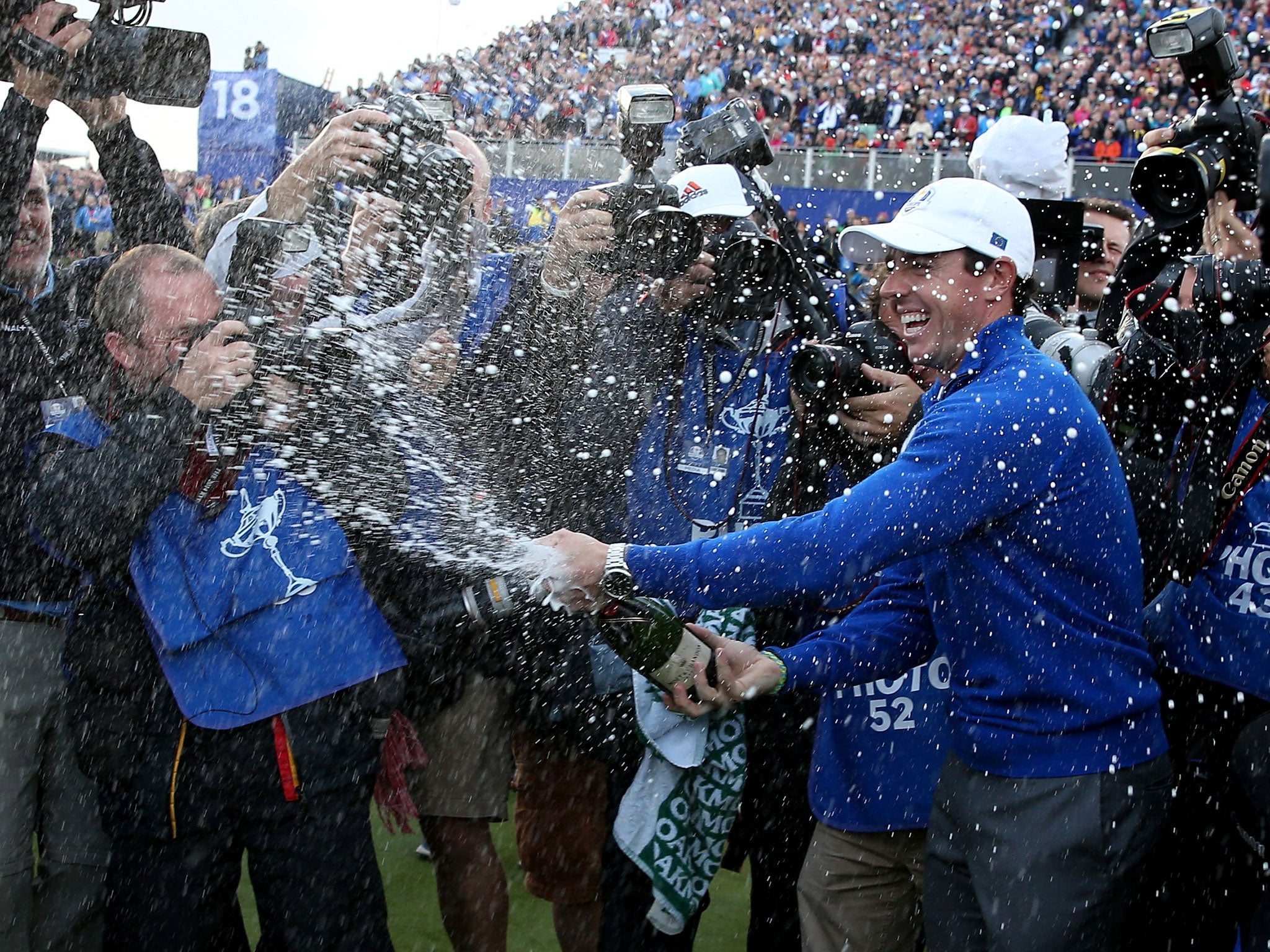 Rory McIlroy sprays the champagne after Europe's Ryder Cup win