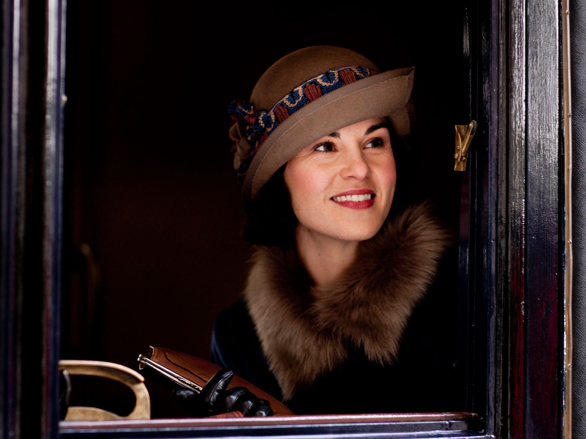 Lady Mary Crawley is all smiles ahead of her saucy weekend with Lord Gillingham