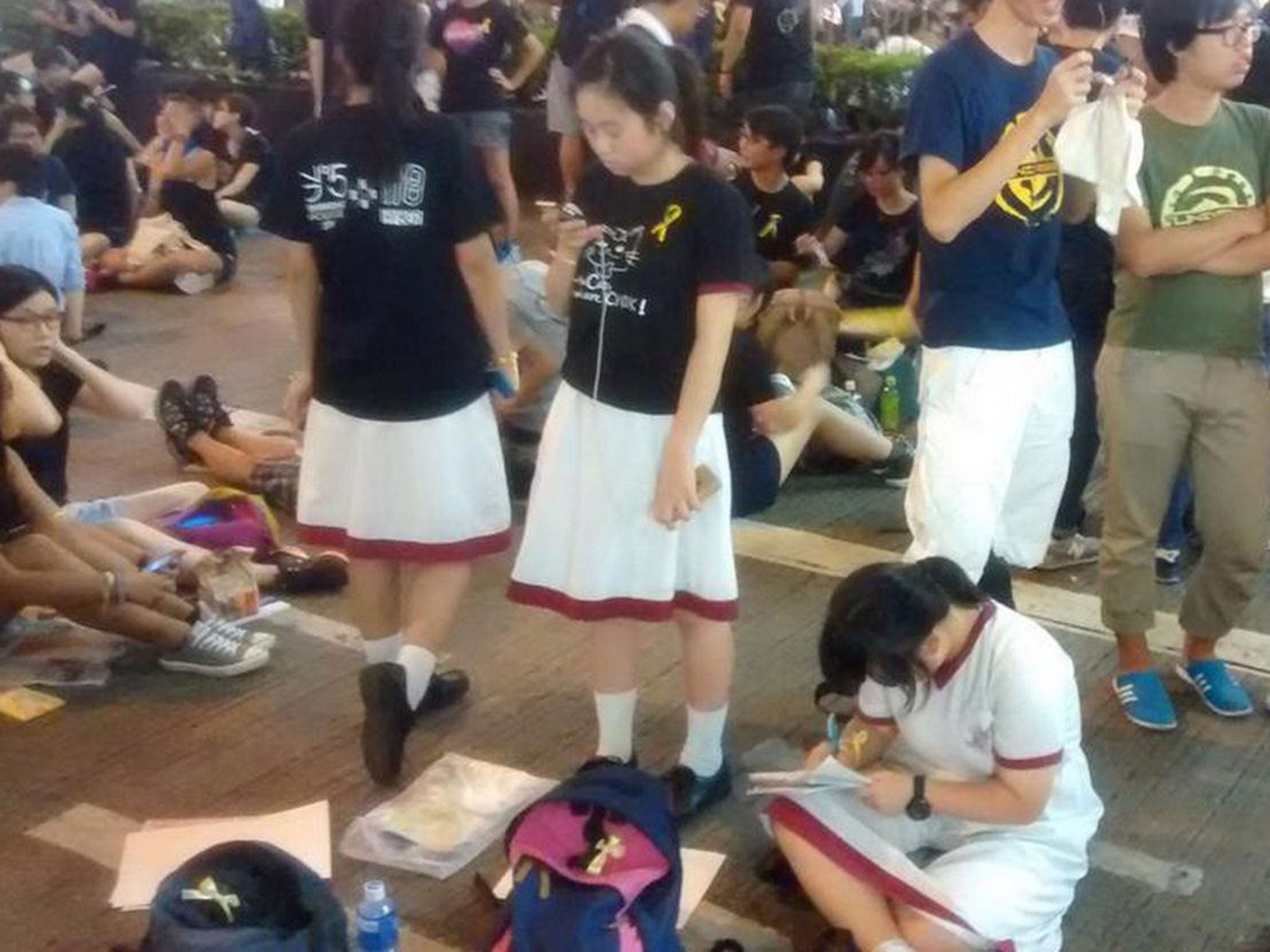 Students doing their homework on Monday as protests continued in central Hong Kong