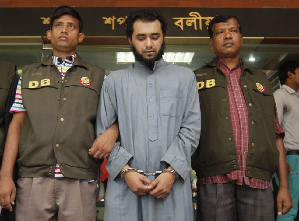Samiun Rahman (centre), has been arrested on suspicion of ties with global jihadist organisations in Dhaka