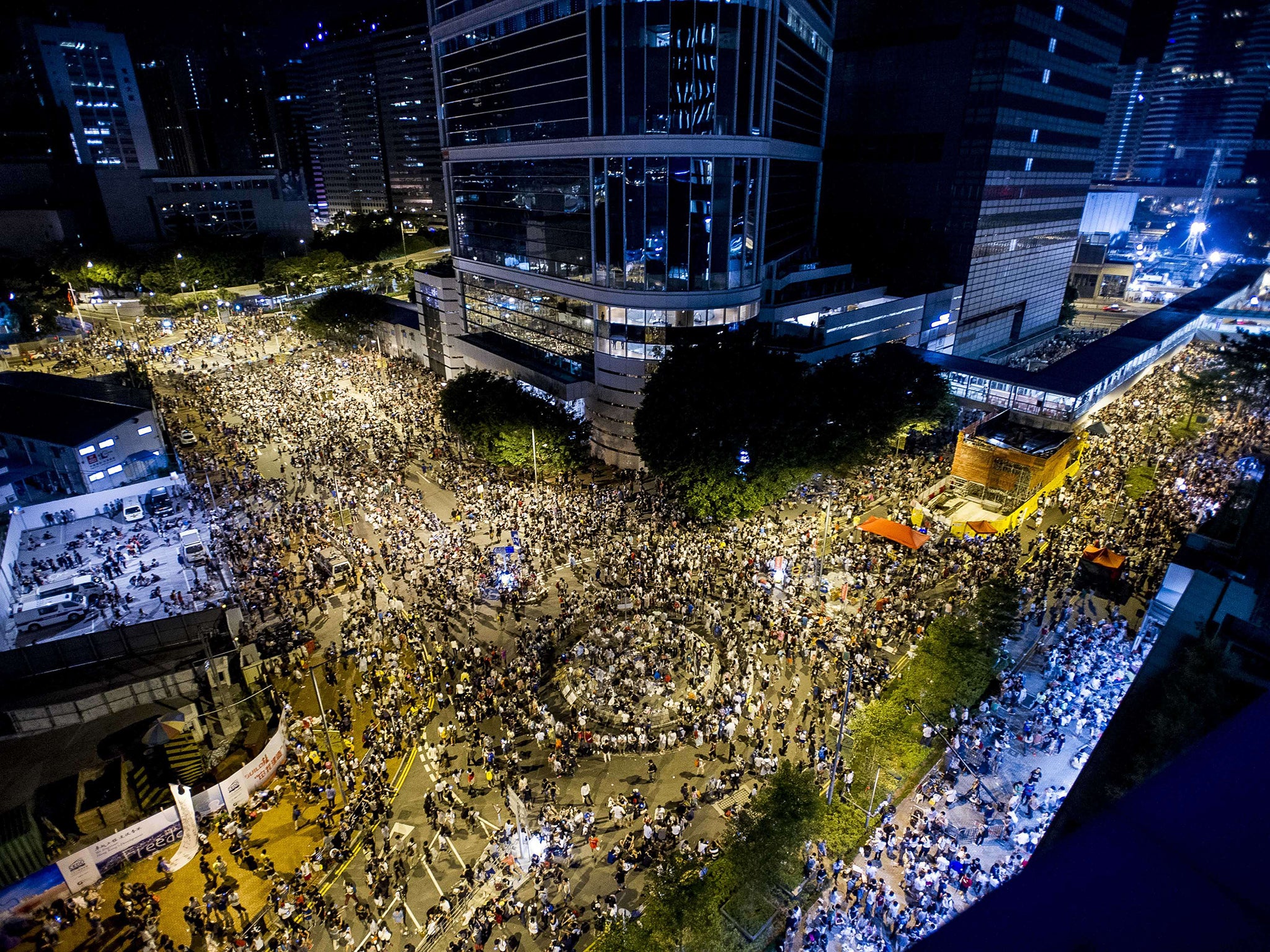 Protesters gather during a demonstration outside headquarters of the Legislative Counsel in Hong Kong
