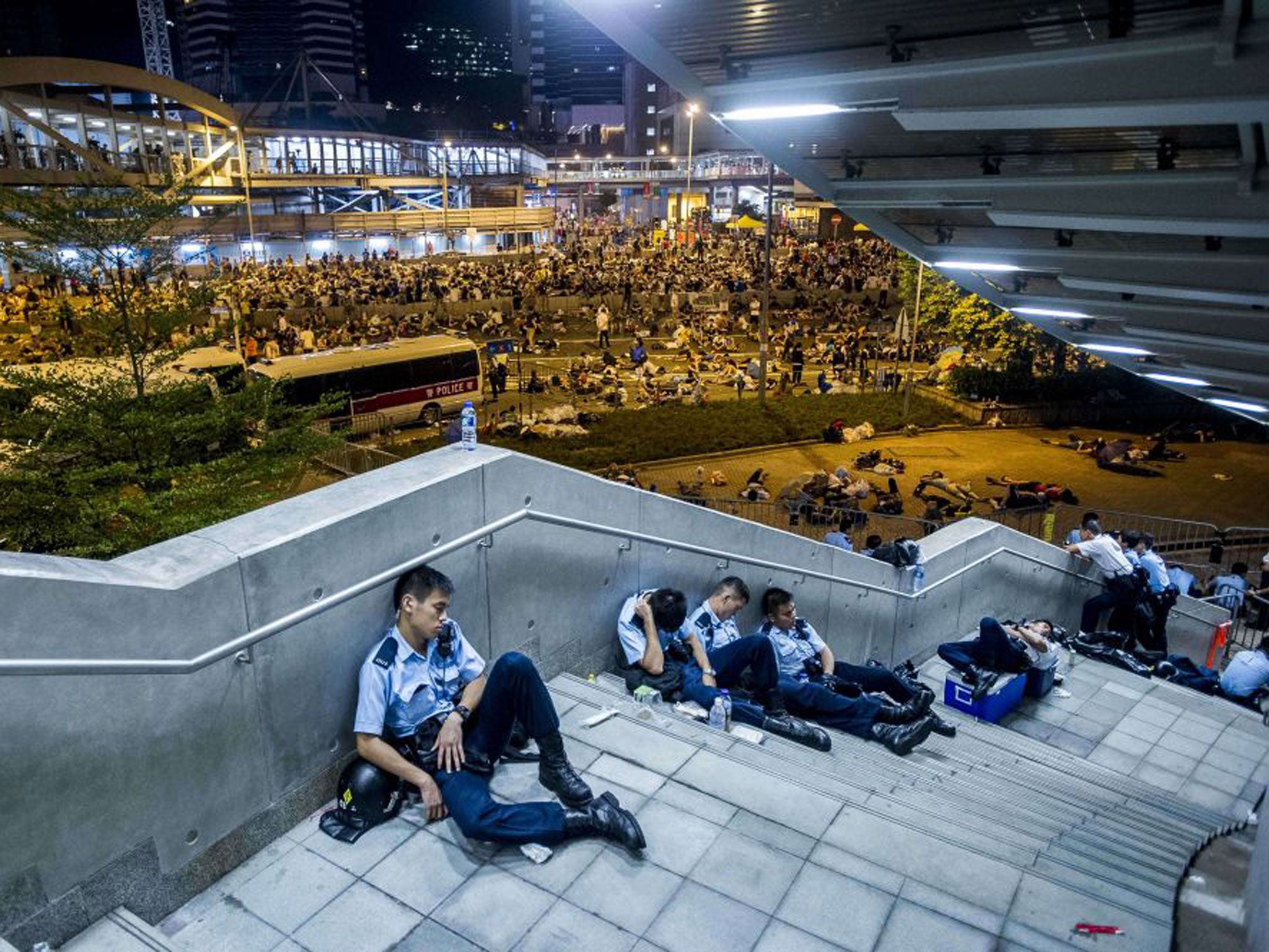 Riot police take a rest
