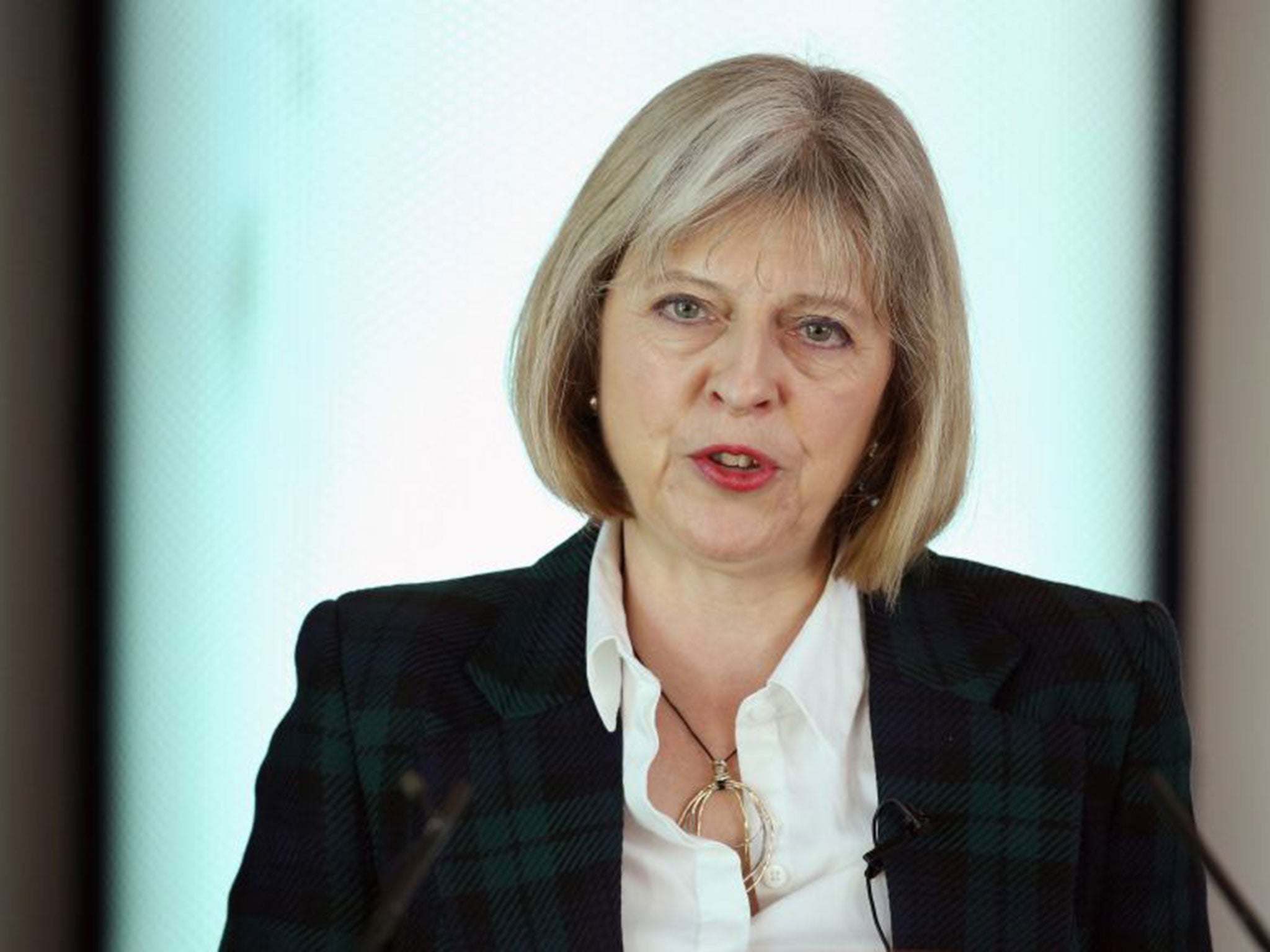 Home Secretary Theresa May will outline plans to curb extremists’ freedom of speech (Getty)