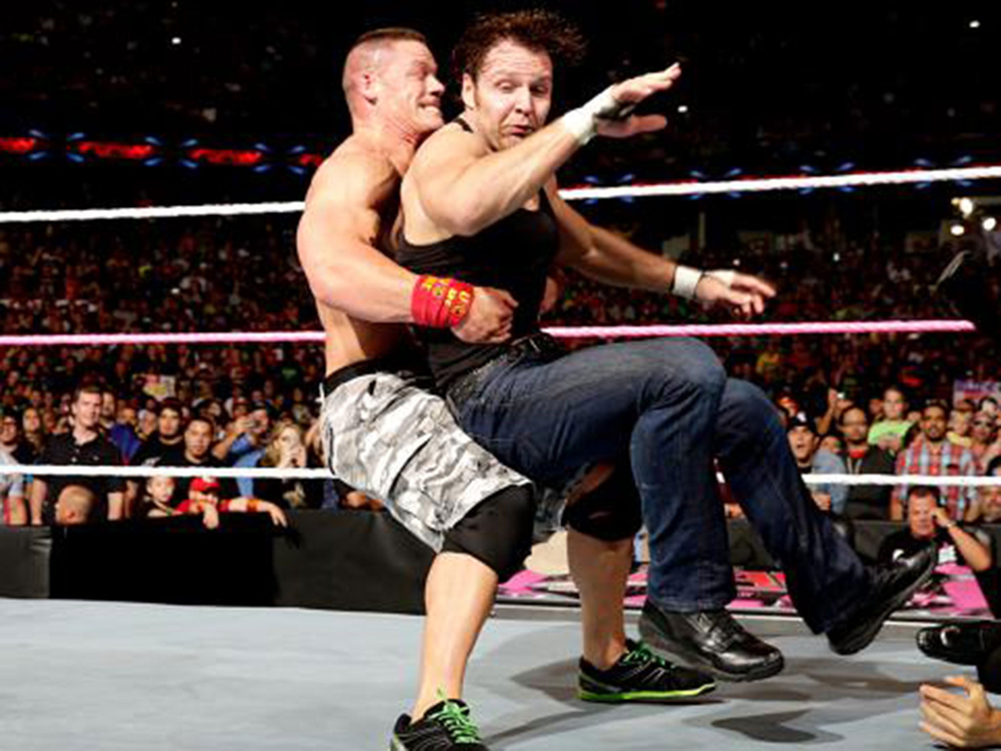 John Cena prevents Dean Ambrose from attacking Seth Rollins