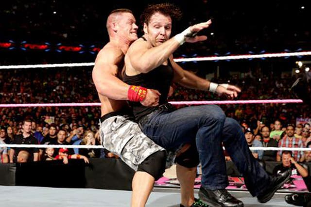 John Cena prevents Dean Ambrose from attacking Seth Rollins