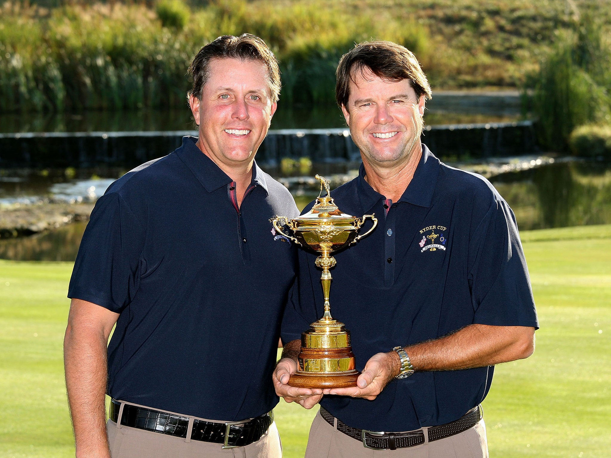 Phil Mickelson and Paul Azinger pose with the Ryder Cup in 2008