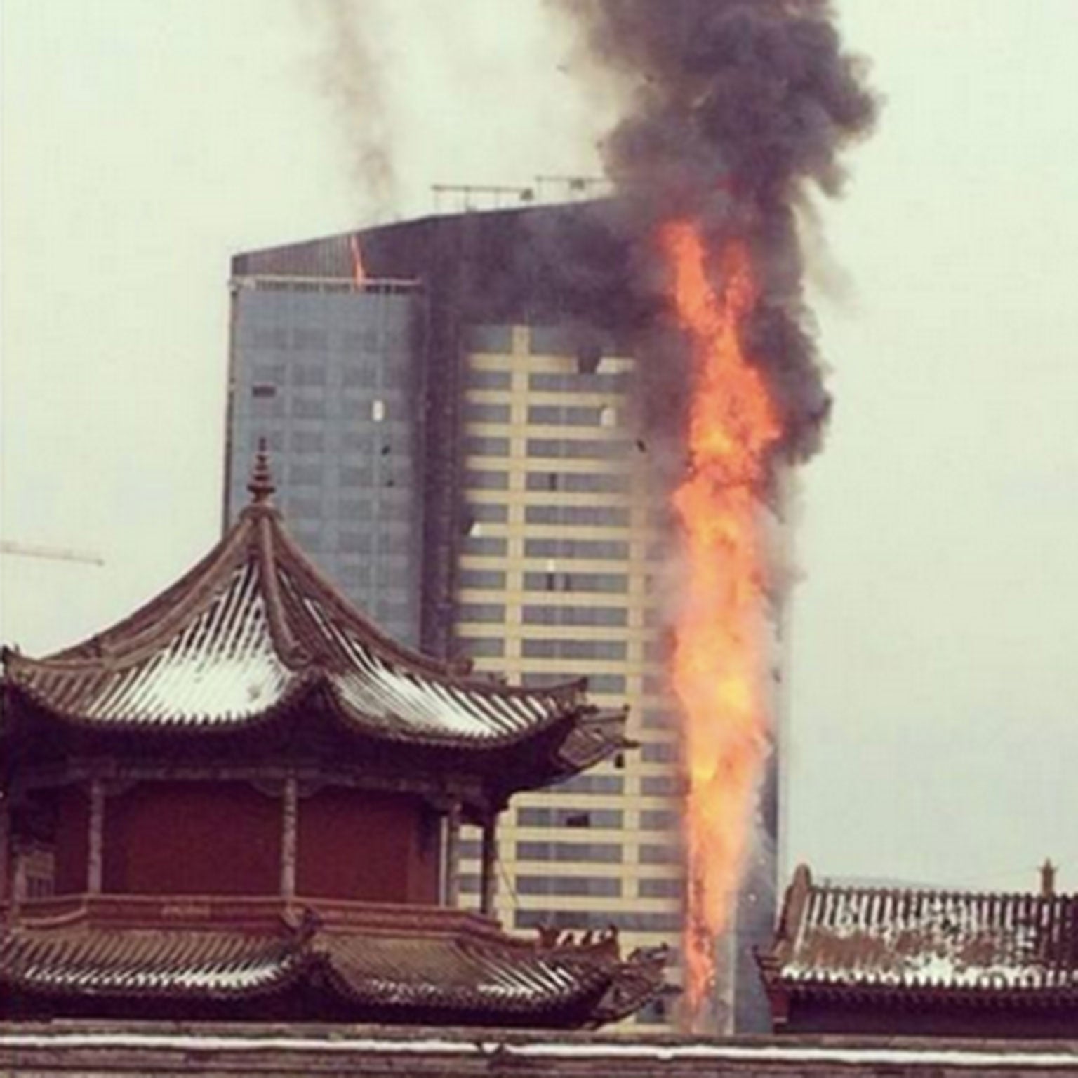 A fire broke out at the high rise Shangri-la Hotel in Mongolia, with smoke and flames visible throughout the afternoon (Pic: A.Anar)
