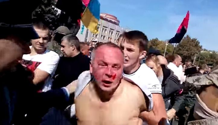 Ukrainian parliamentarian Nestor Shufrych was beaten up by a mob of activities
