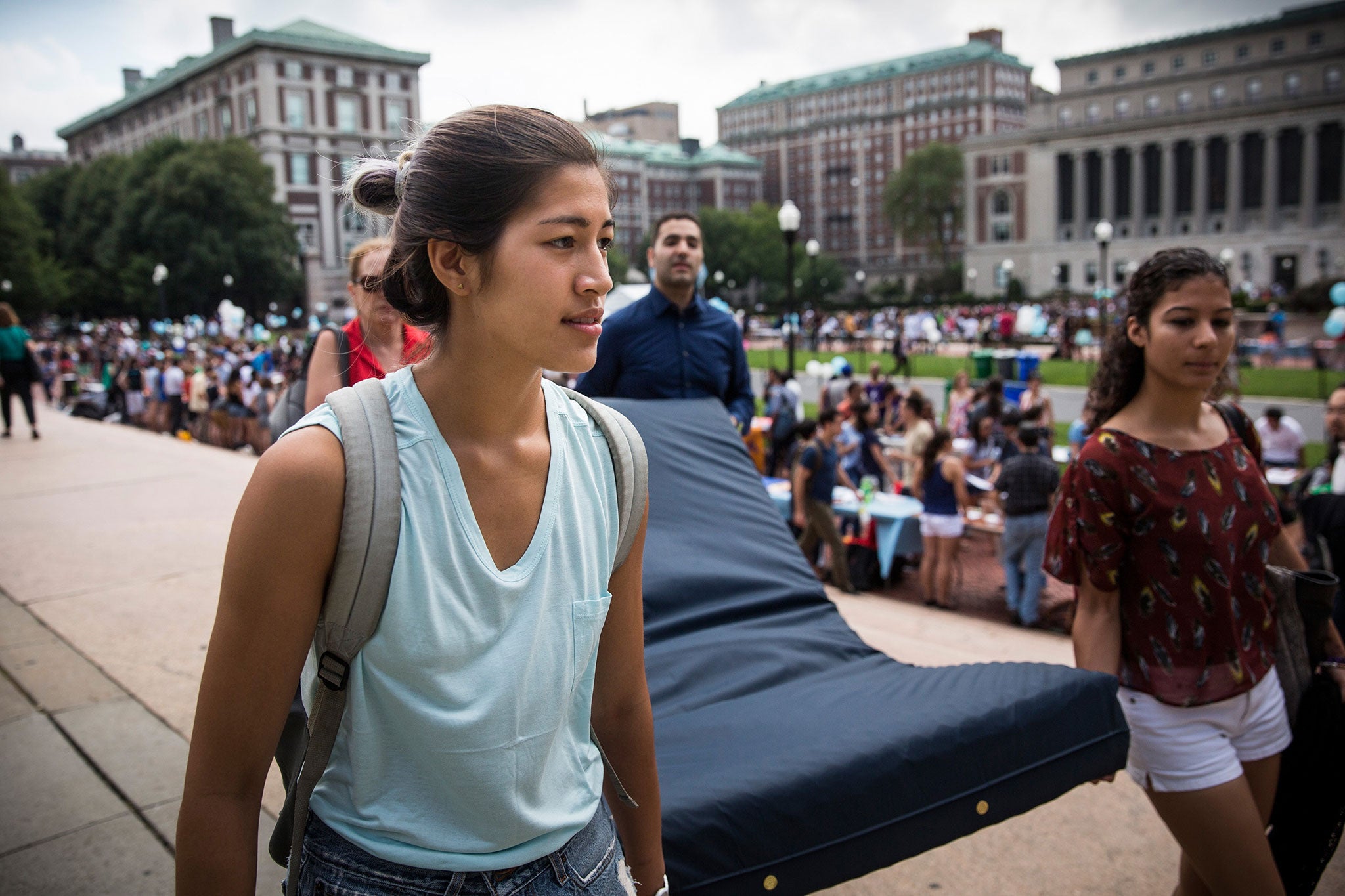 Columbia University student Emma Sulkowicz carries her mattress around campus as a form of protest