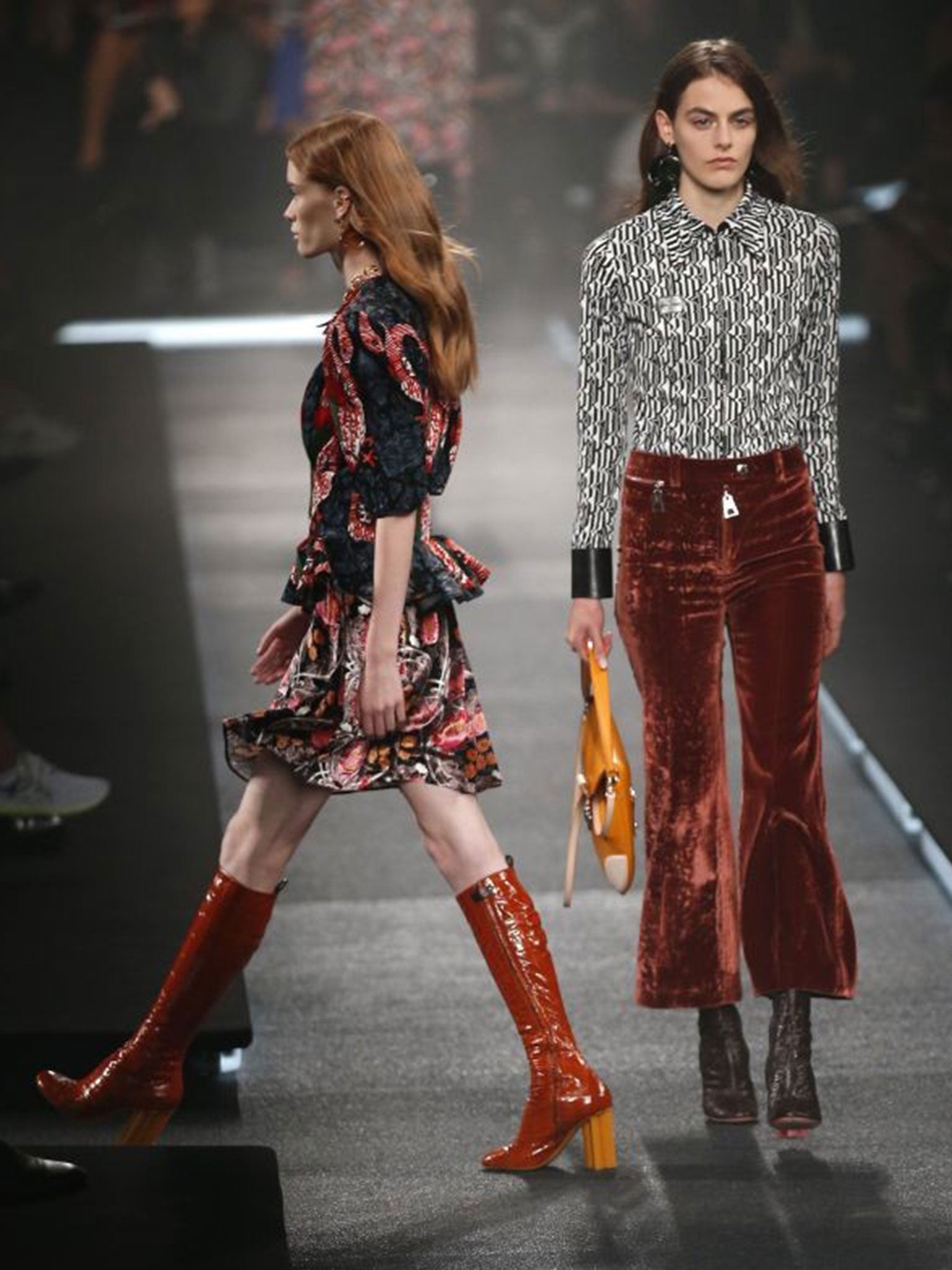 Models present Louis Vuitton's Spring/Summer 2015 ready-to-wear fashion collection during Paris Fashion Week