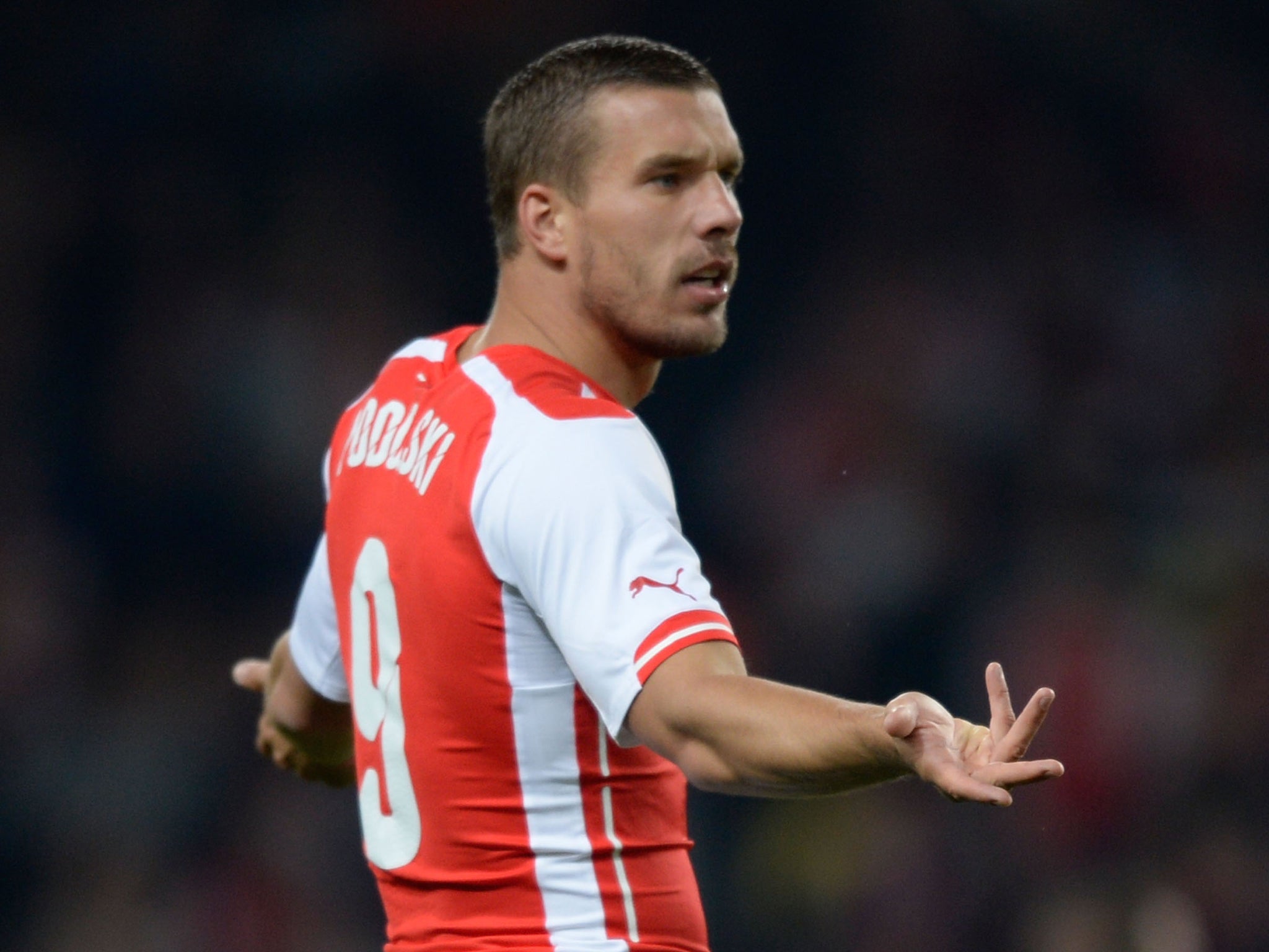 Lukas Podolski on a rare appearance for Arsenal this season