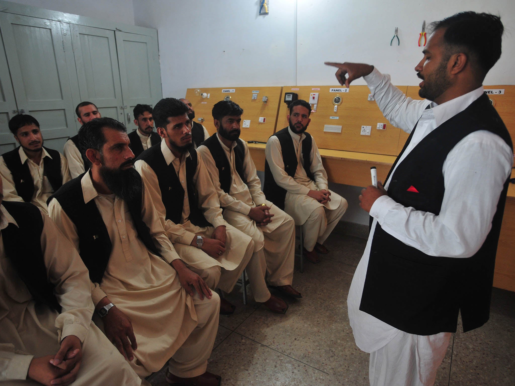 Pakistani men who worked under Taliban attend a class at the army-run de-radicalisation centre of Mishal School in Barikot tehsil of Swat valley (FAROOQ NAEEM/AFP/Getty Images)