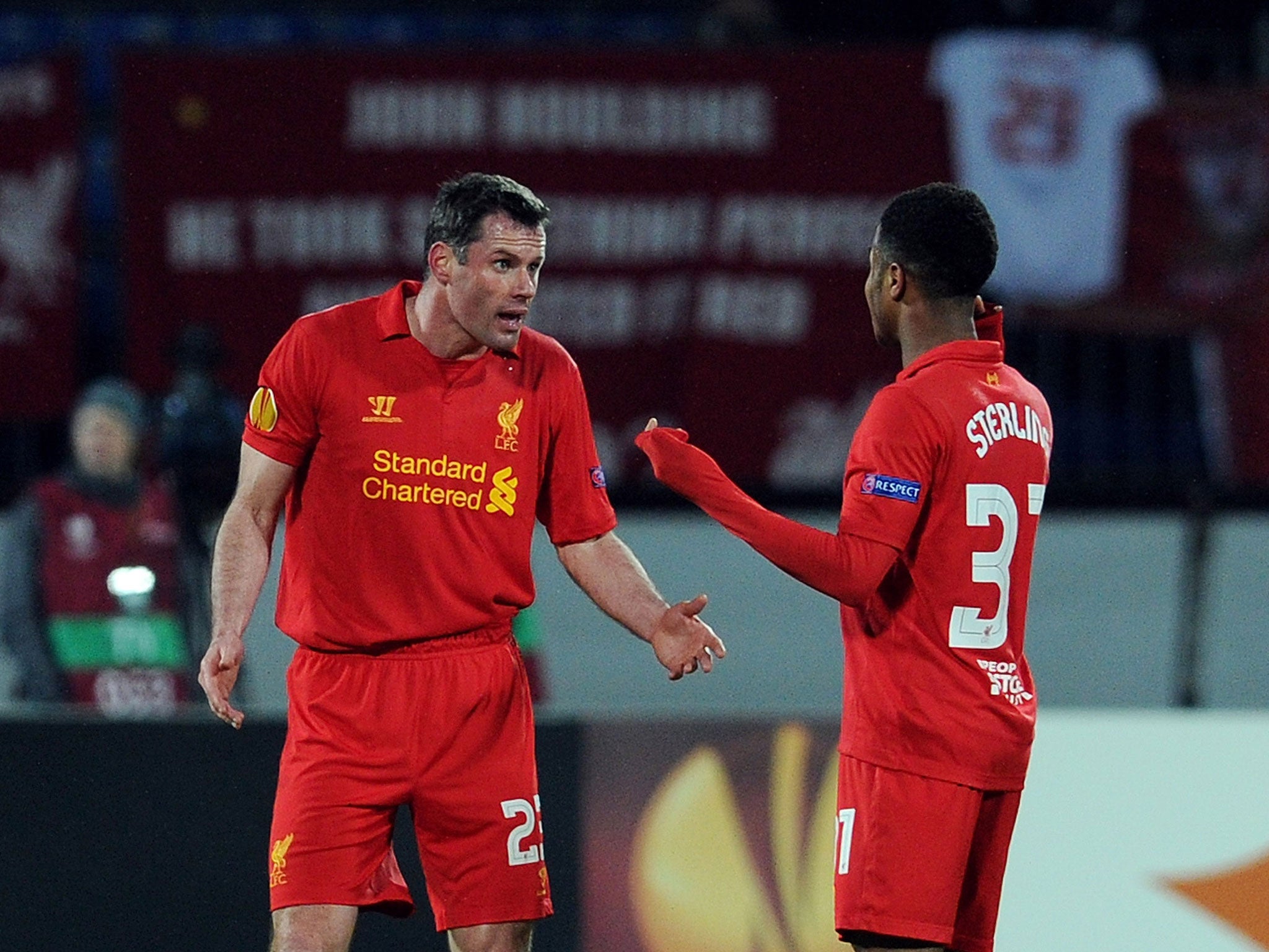 Jamie Carragher and Raheem Sterling in the latter days of Carragher's Liverpool career