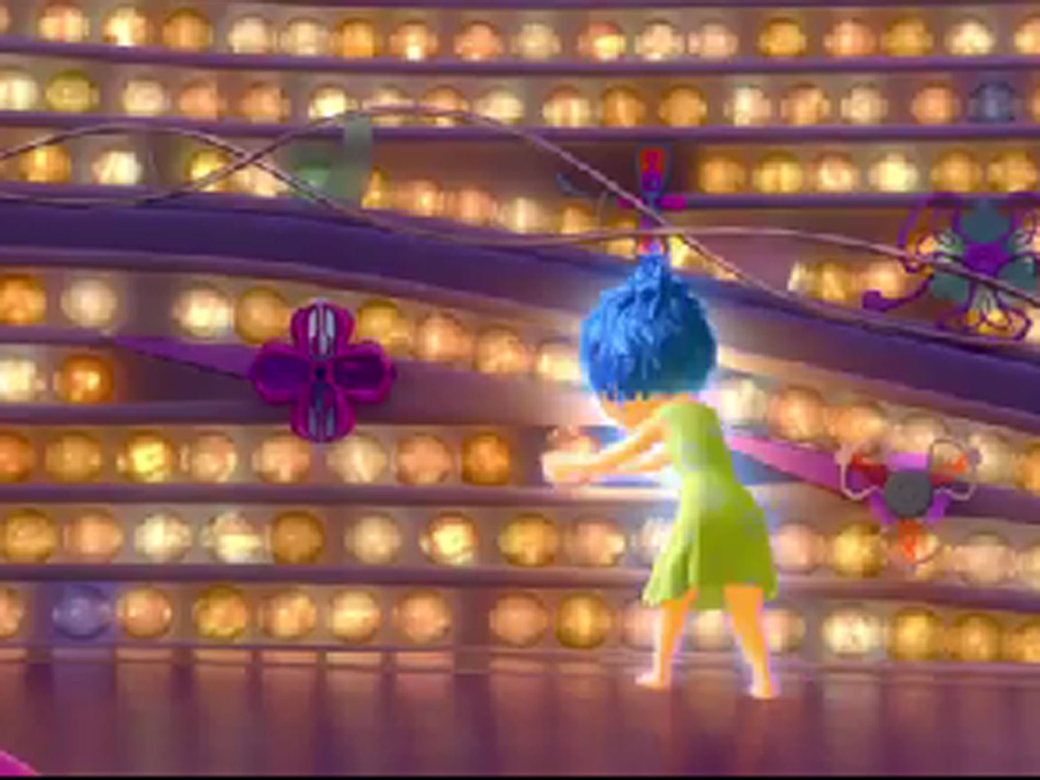 Inside Out: Emotions are depicted as golden orbs stored in the mind's control centre