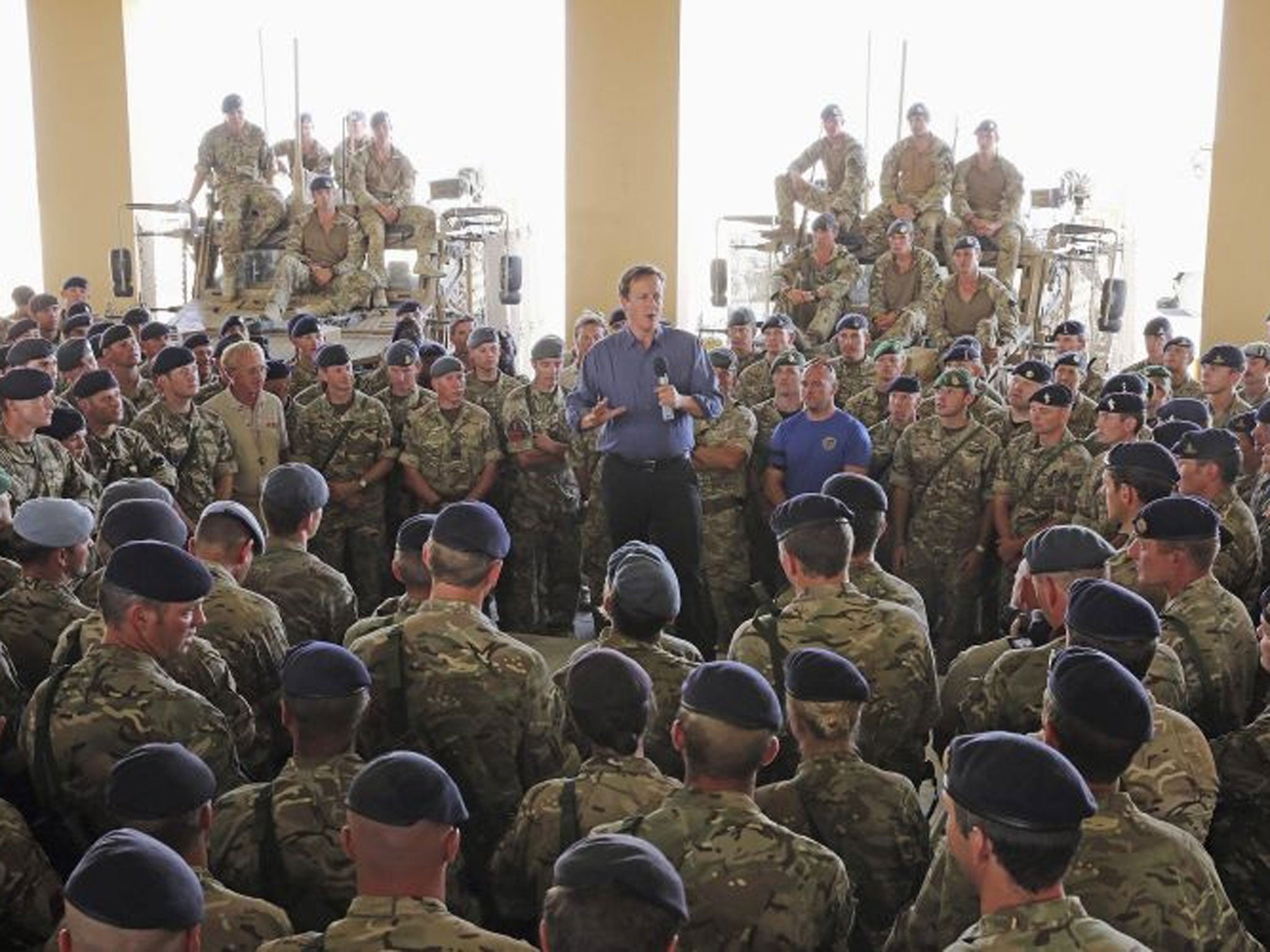 Britain's Prime Minister David Cameron addresses British troops at Camp Bastion in southern Afghanistan (Reuters)