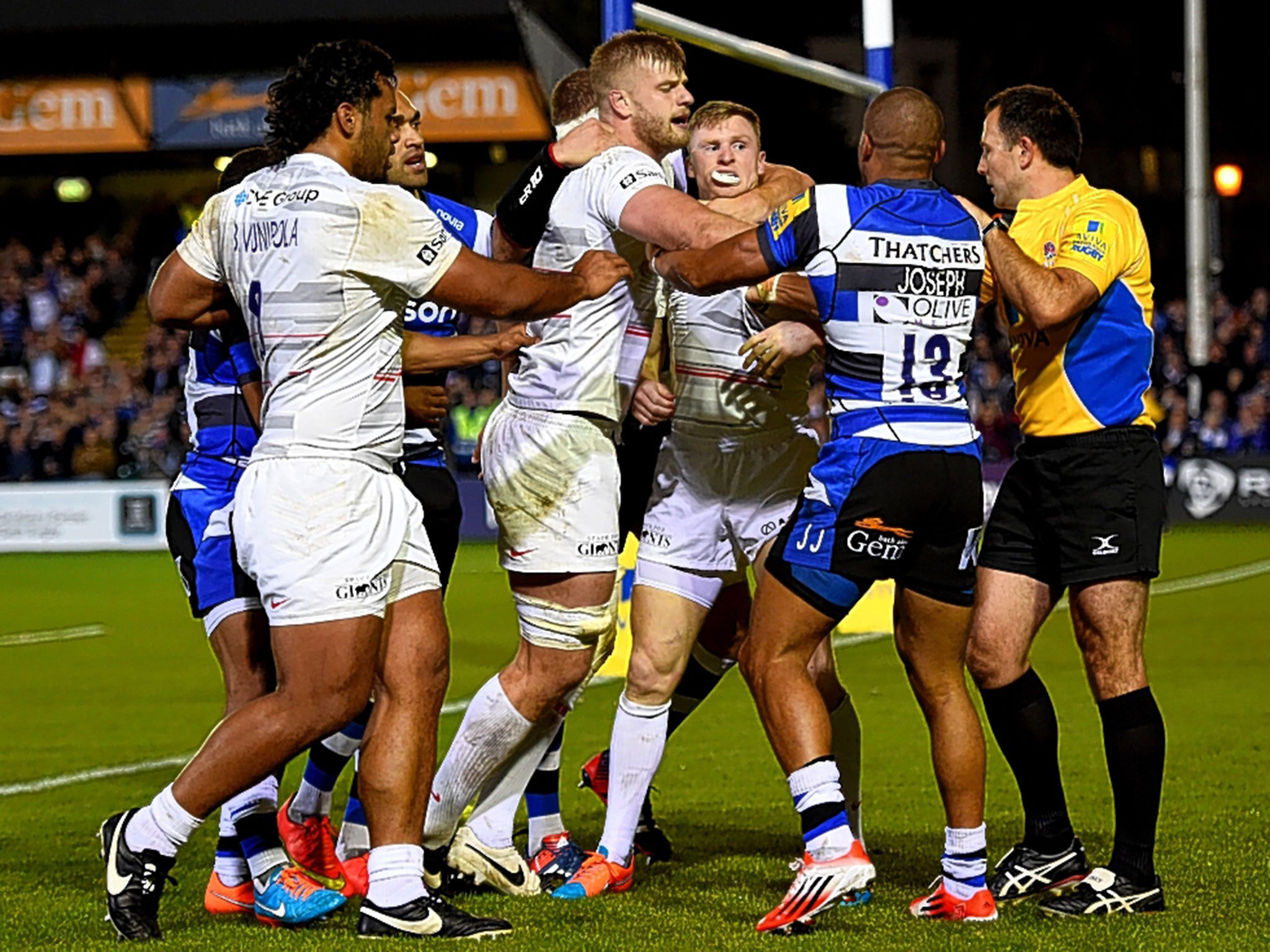 Jonathan Joseph (right) clashes with Chris Ashton of Saracens after scoring Bath’s first try. Ashton was sent to the sin bin