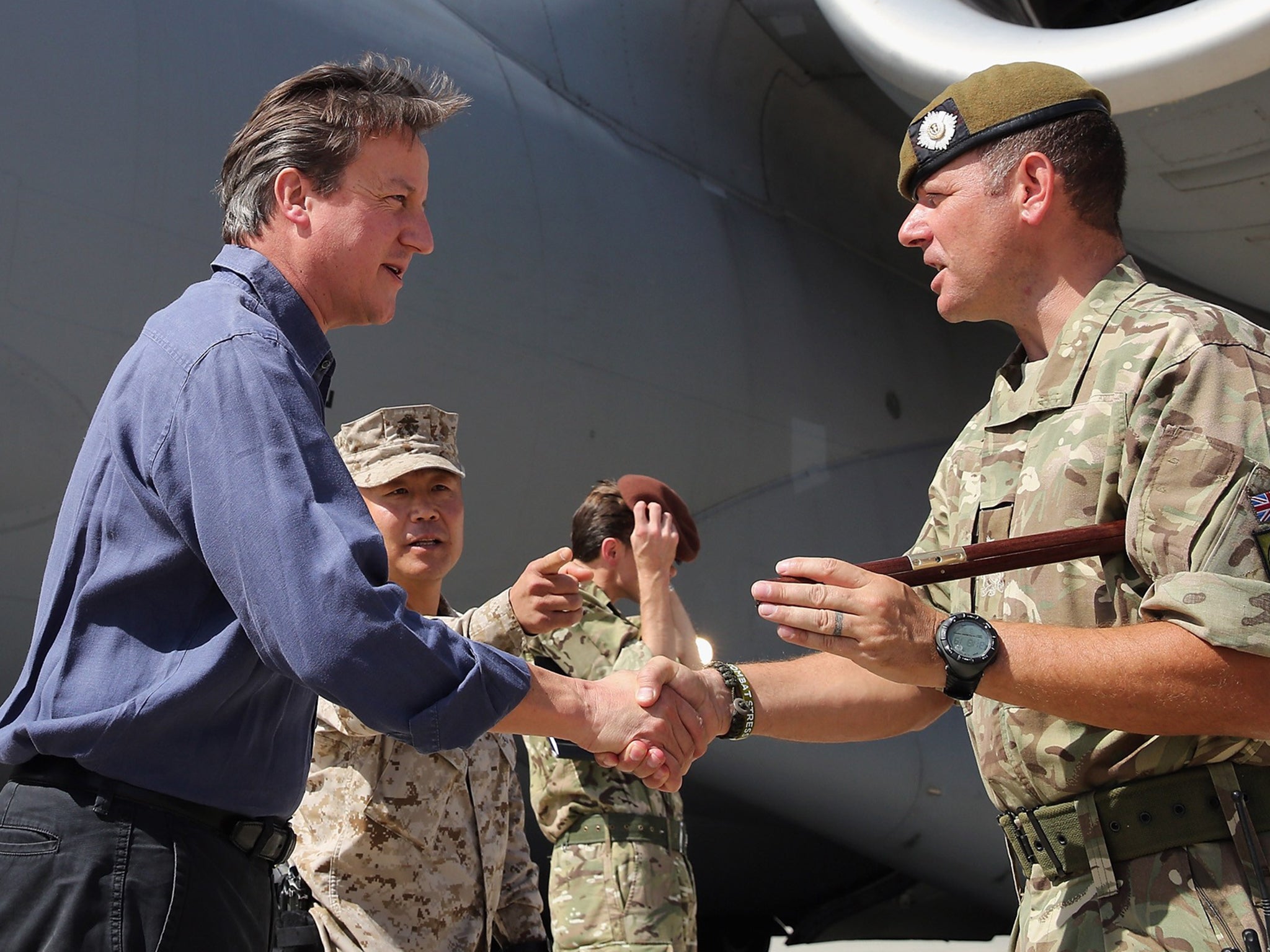 David Cameron is welcomed on his arrival at Camp Bastion