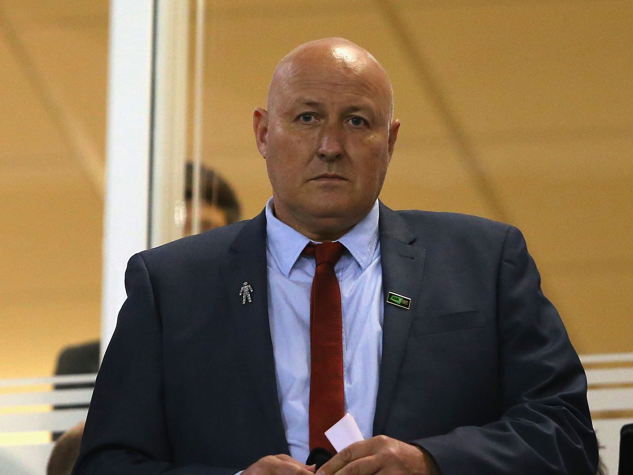 Russell Slade watches the match at Bloomfield Road