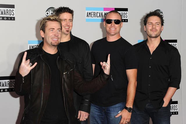 Members of Nickelback at the 2011 American Music Awards