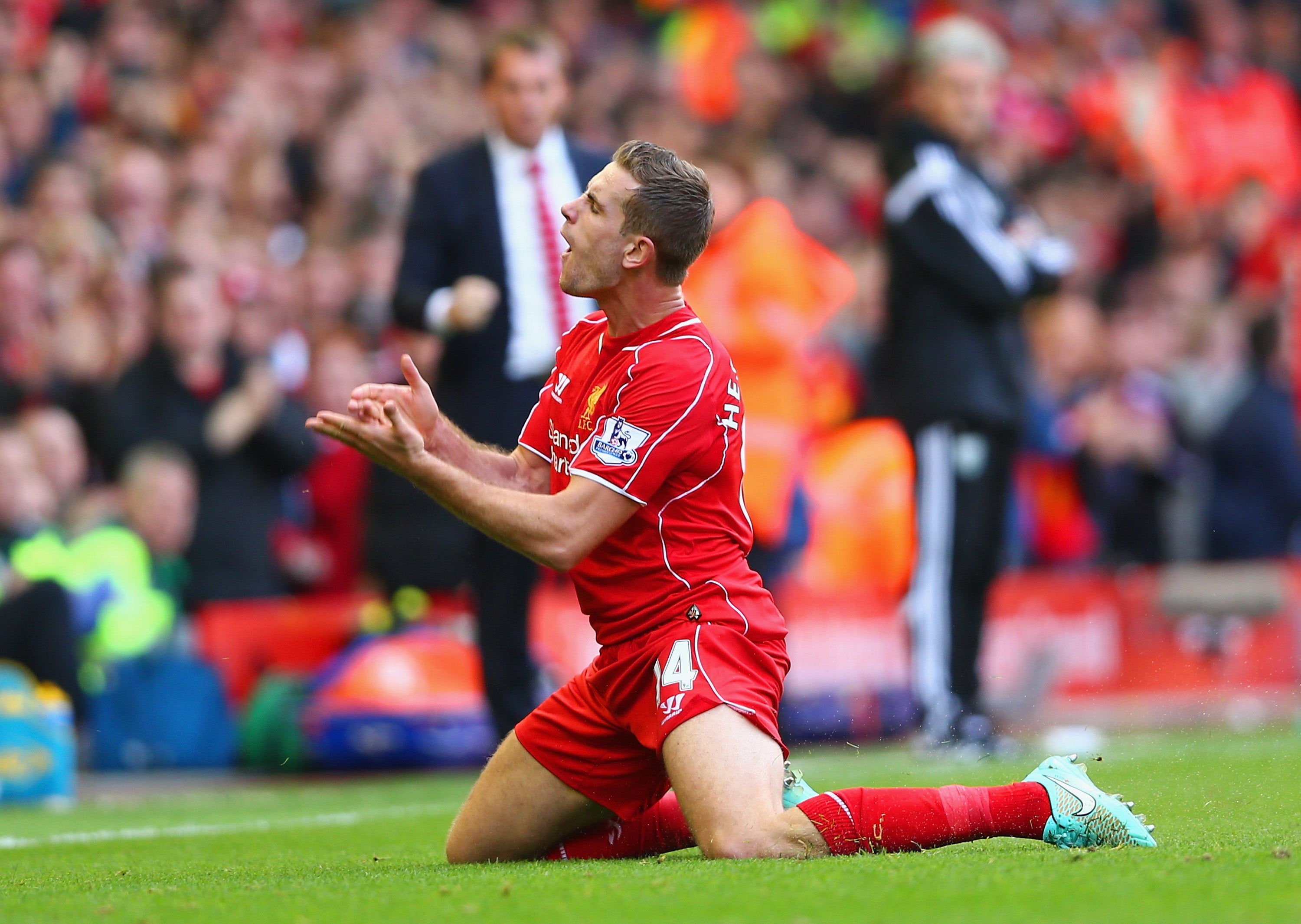 Jordan Henderson celebrates scoring the match-winner