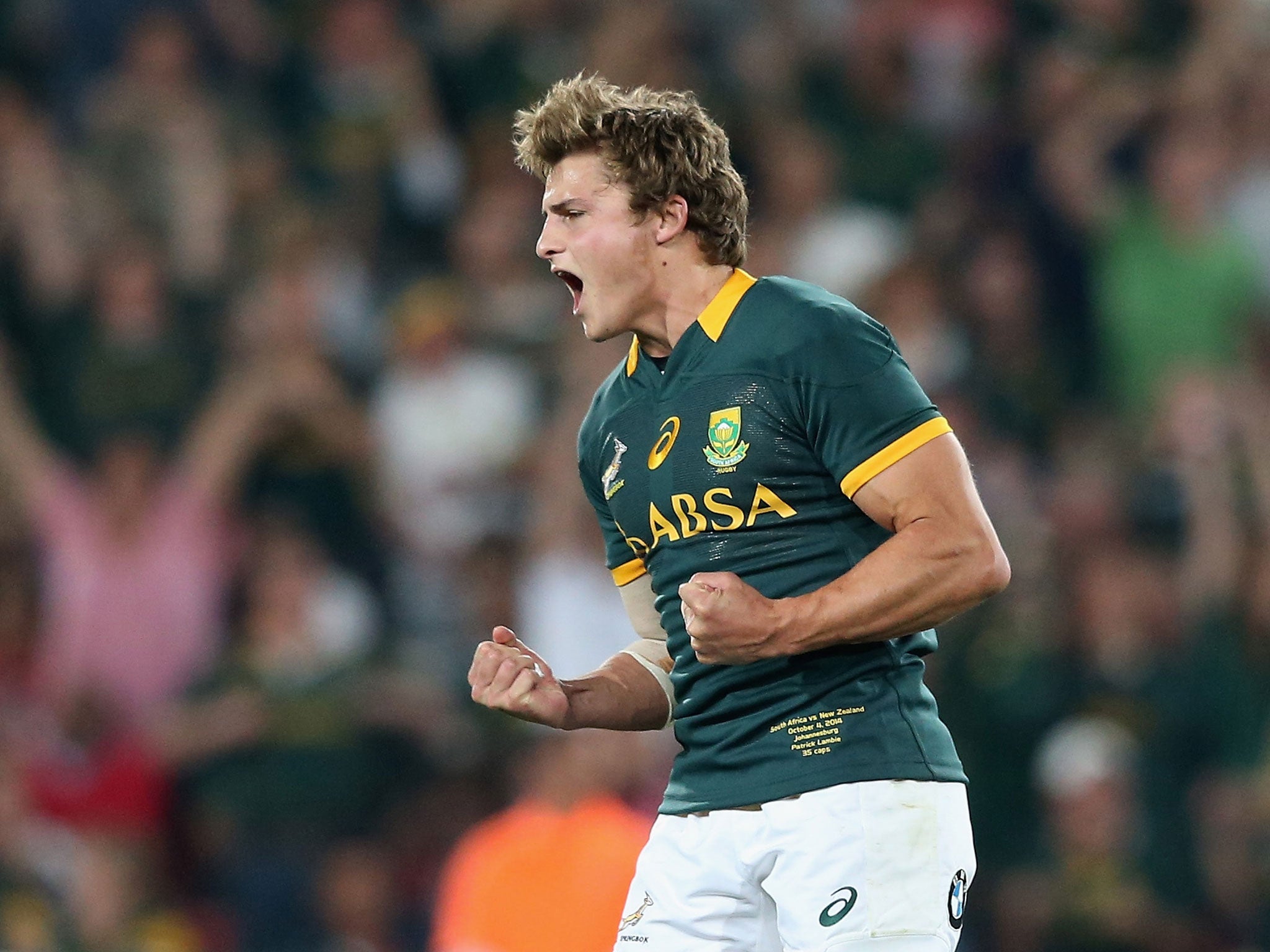 South Africa fly-half Patrick Lambie celebrates kicking the match-winning penalty