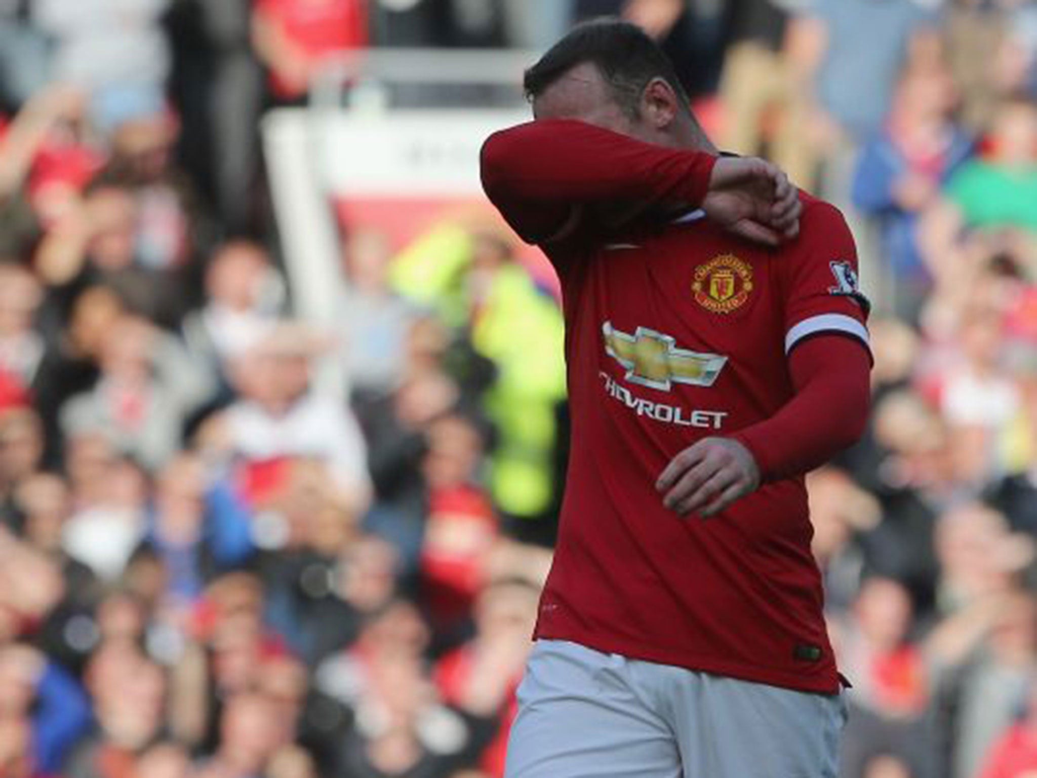 Wayne Rooney feels the pain of being sent off last against West Ham United last week