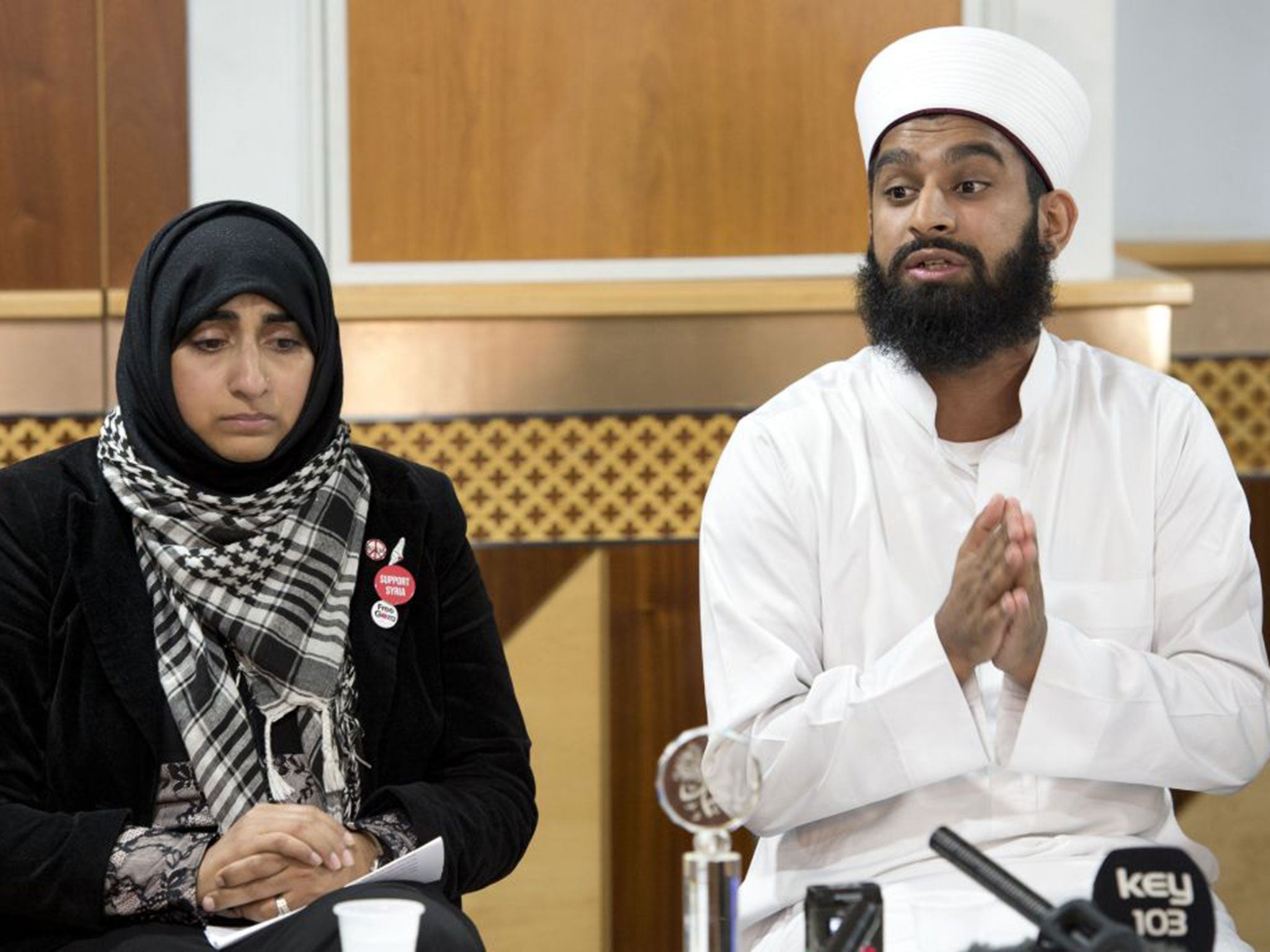 Imam Muhammed Asim Hussain, right, hailed Alan Henning as a "national hero"