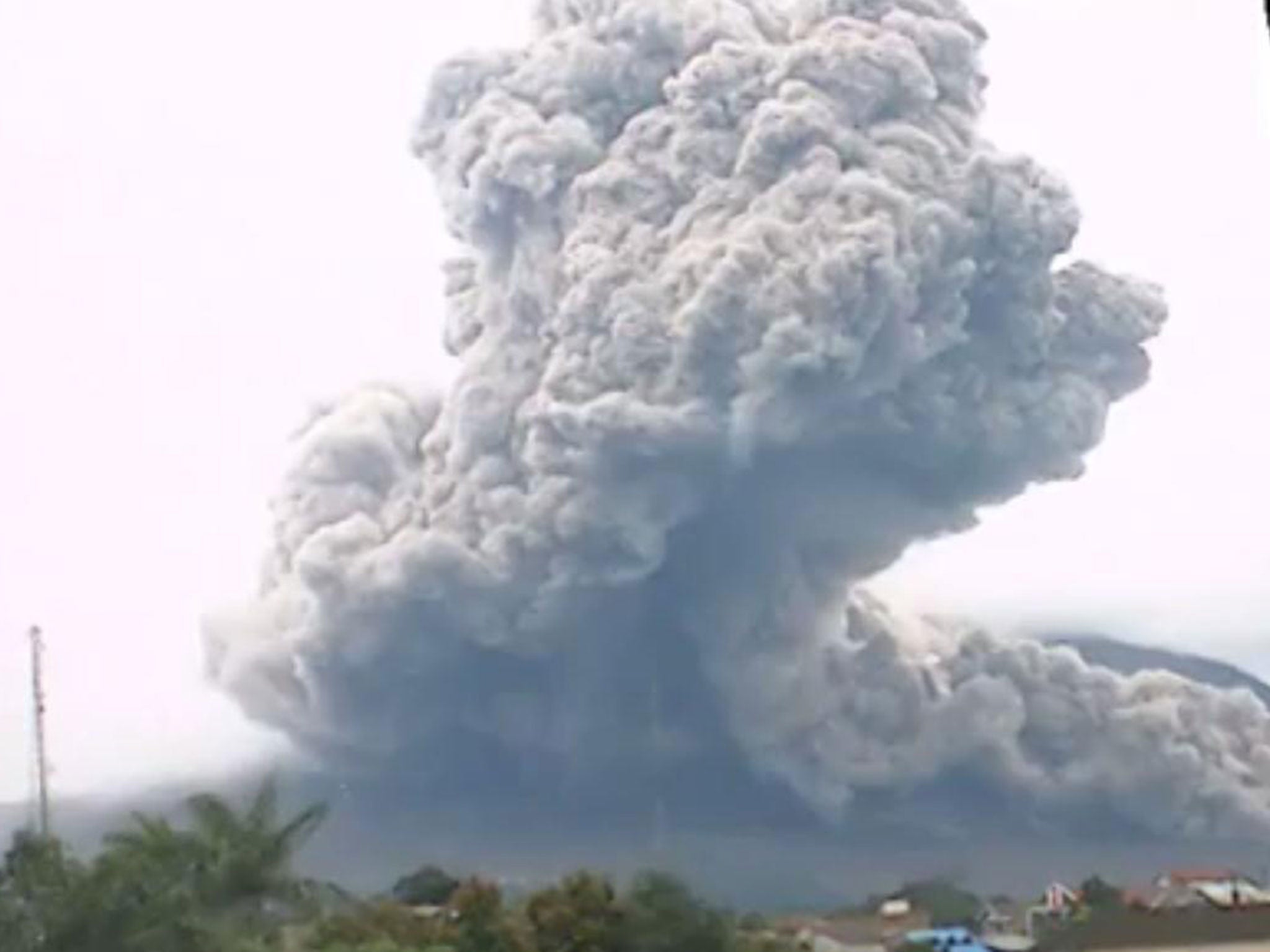 Mount Sinabung erupting on 5 October 2014