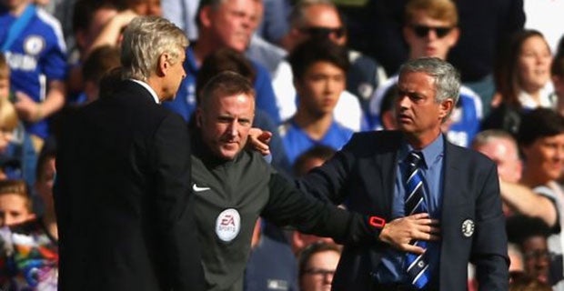 The managers are separated by the fourth official