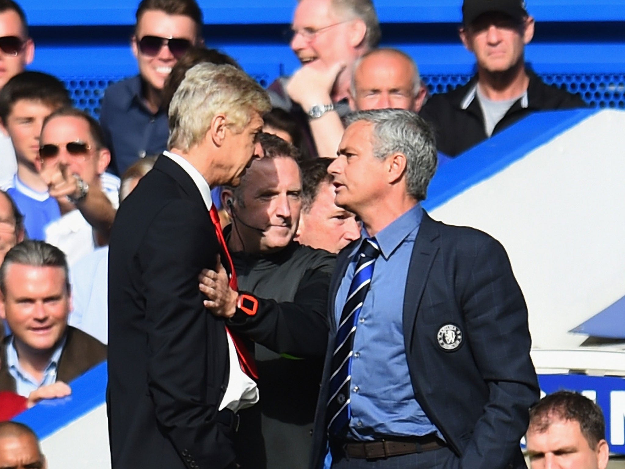 Wenger pushes Mourinho during the 2-0 defeat to Chelsea