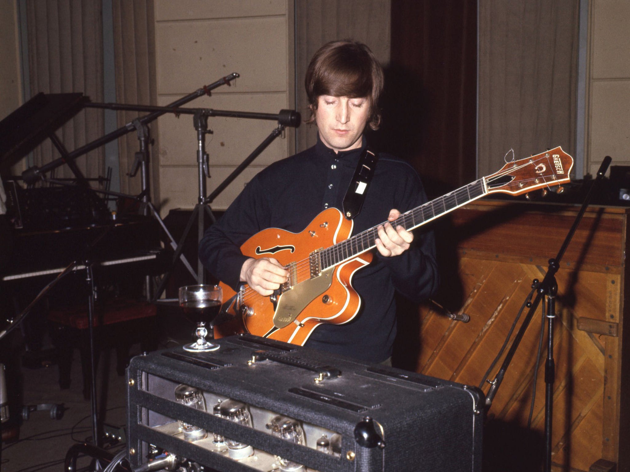 John Lennon with the Gretsch 6120 guitar