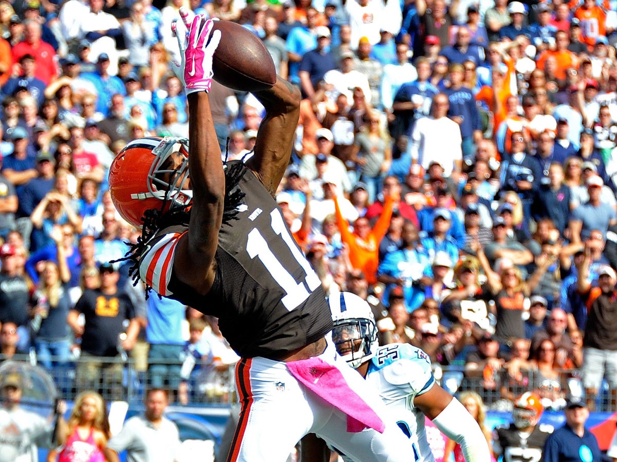 Cleveland Browns wide receiver Travis Benjamin runs the ball during  preseason NFL football game between the Browns and the St. Louis Rams  Saturday, Aug. 23, 2014, in Cleveland. (AP Photo/Tony Dejak Stock