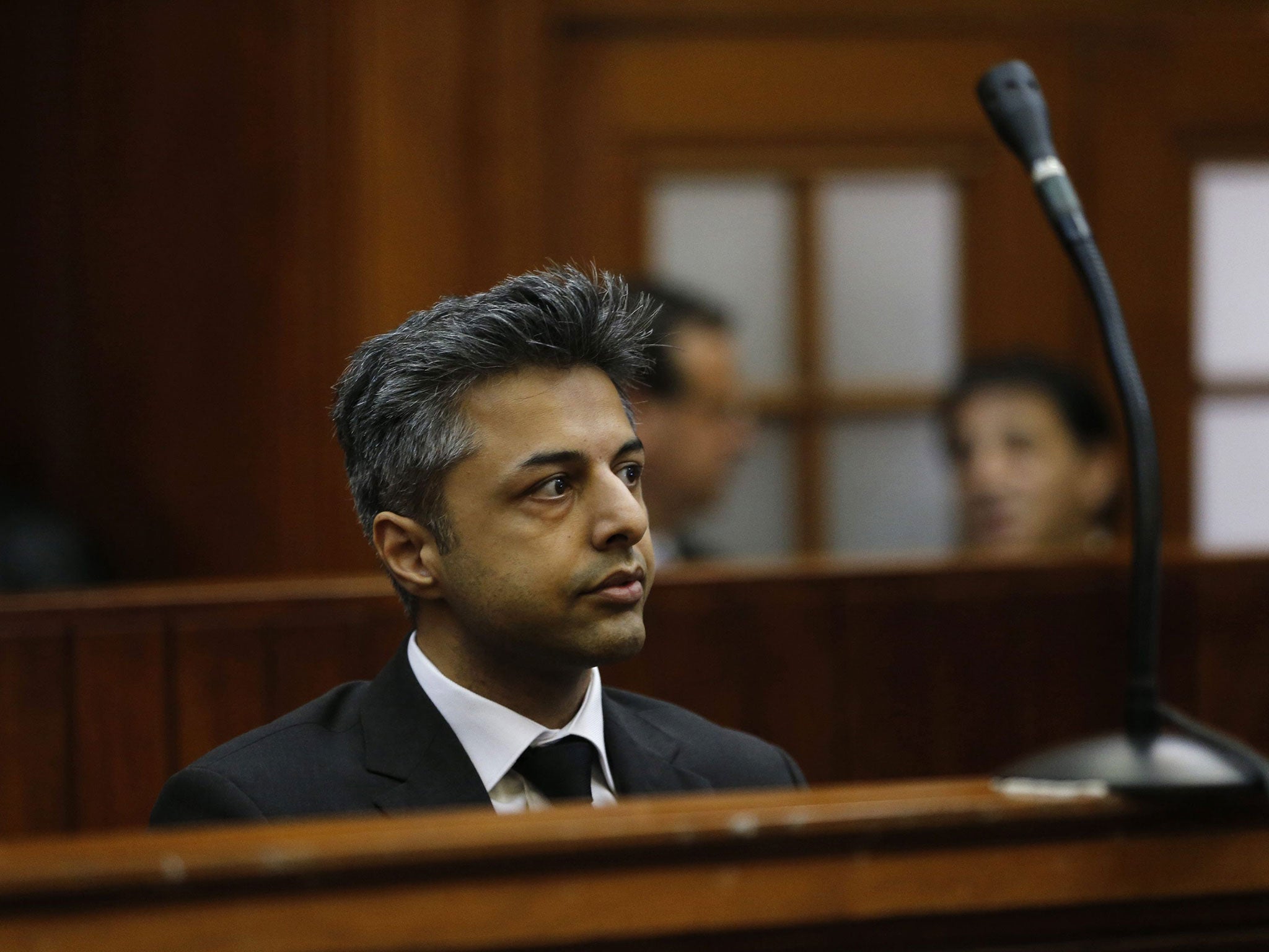 British businessman Shrien Dewani sits in the dock before the start of his trial at the Western Cape High Court, Cape Town,