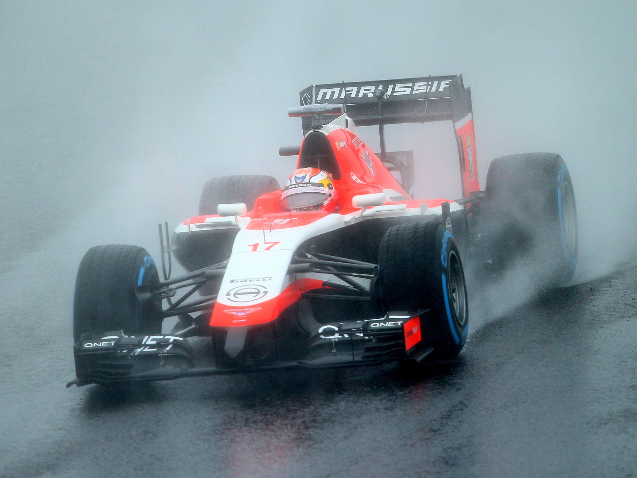 Jules Bianchi drives through the rain at the Japanese Grand Prix