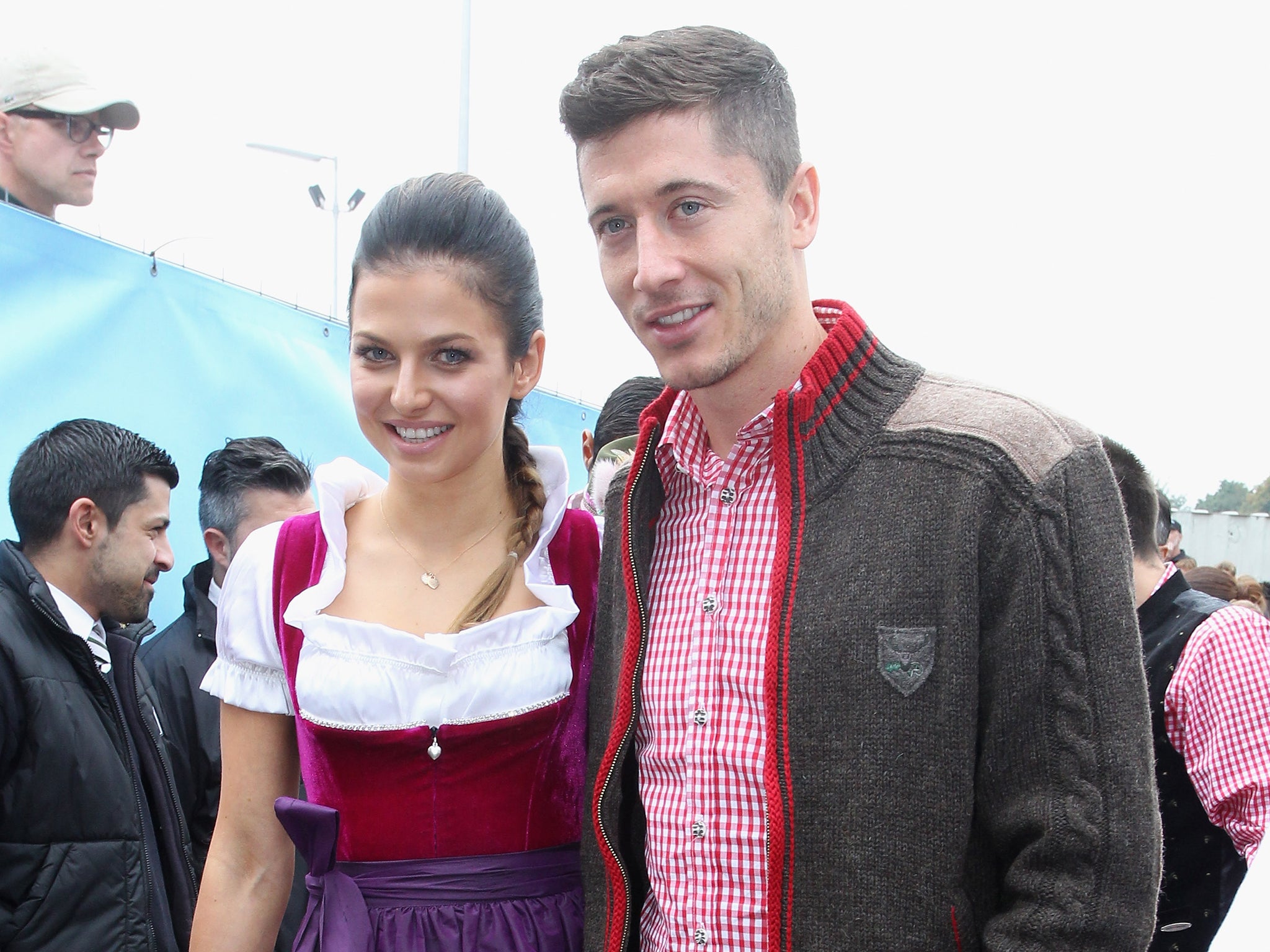 Robert Lewandowski (L) of Bayern Munich and Anna Stachurska
