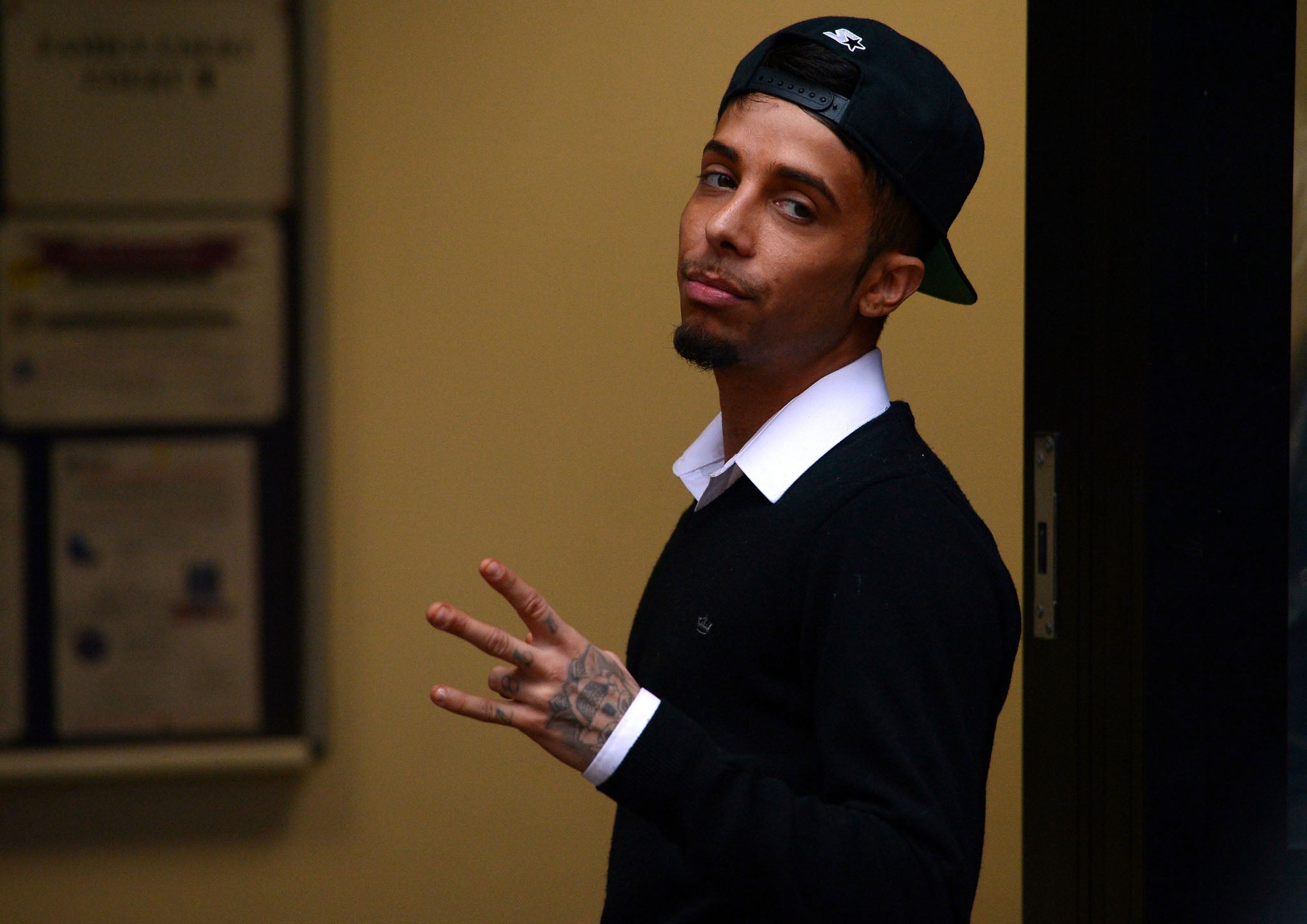 Dappy declared "I'm free" to reporters after his sentencing for assaulting a man in a Reading nightclub was adjourned to Crown Court.