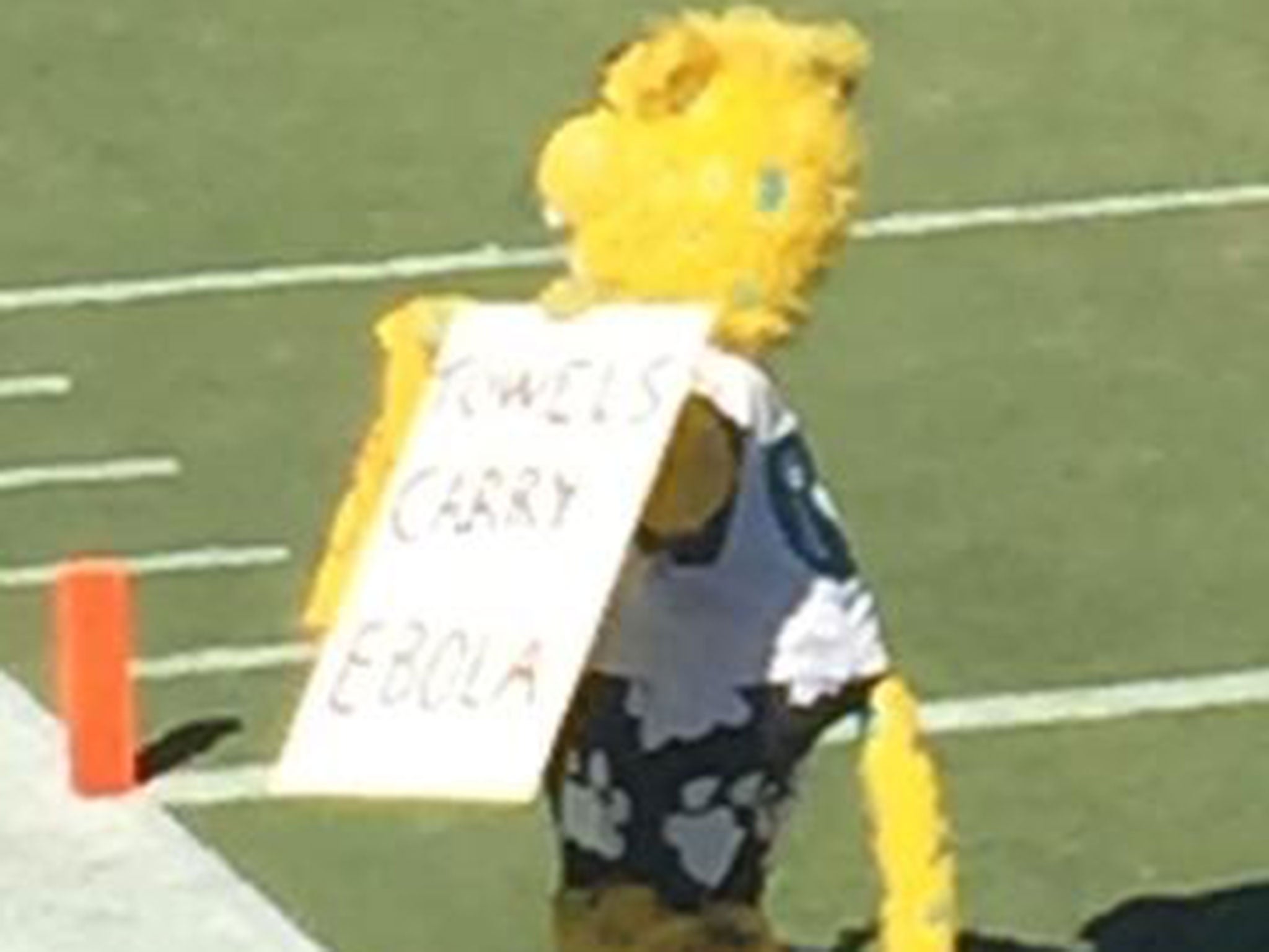 Jacksonville Jaguars mascot Jaxson de Ville holds up an inappropriate sign during the match against the Pittsburgh Steelers that reads 'Towels carry Ebola'