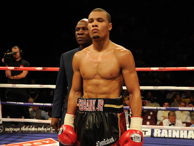 <p>Chris Eubank Jr with his father </p>