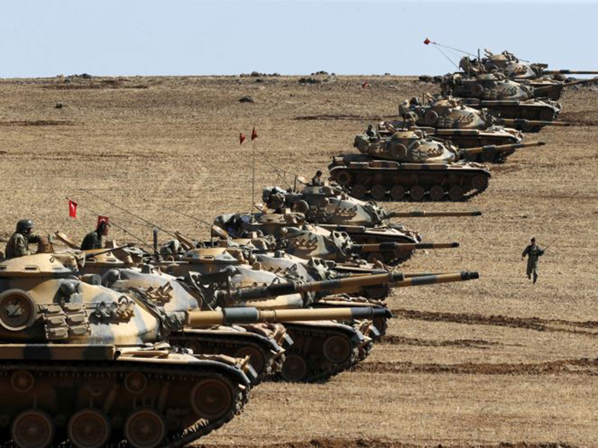 Turkish army tanks take up position on the Syrian border, but their presence is unlikely to have much bearing on the fate of Kobani, which is almost in the hands of Isis 
