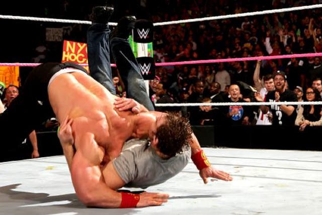 Dean Ambrose hits John Cena with the Dirty Deeds