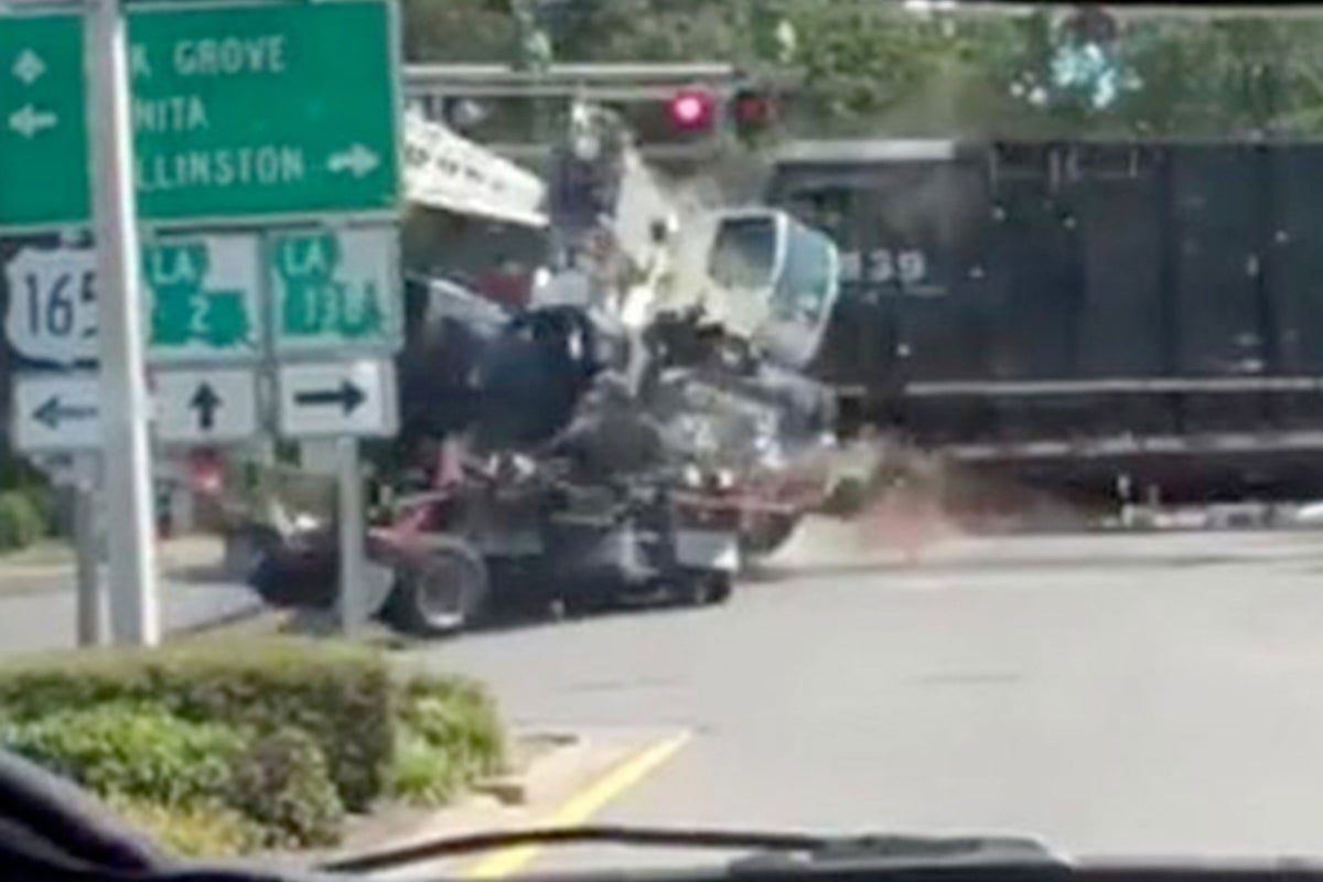 Video: Train smashes into a truck stuck on level crossing in incredible ...