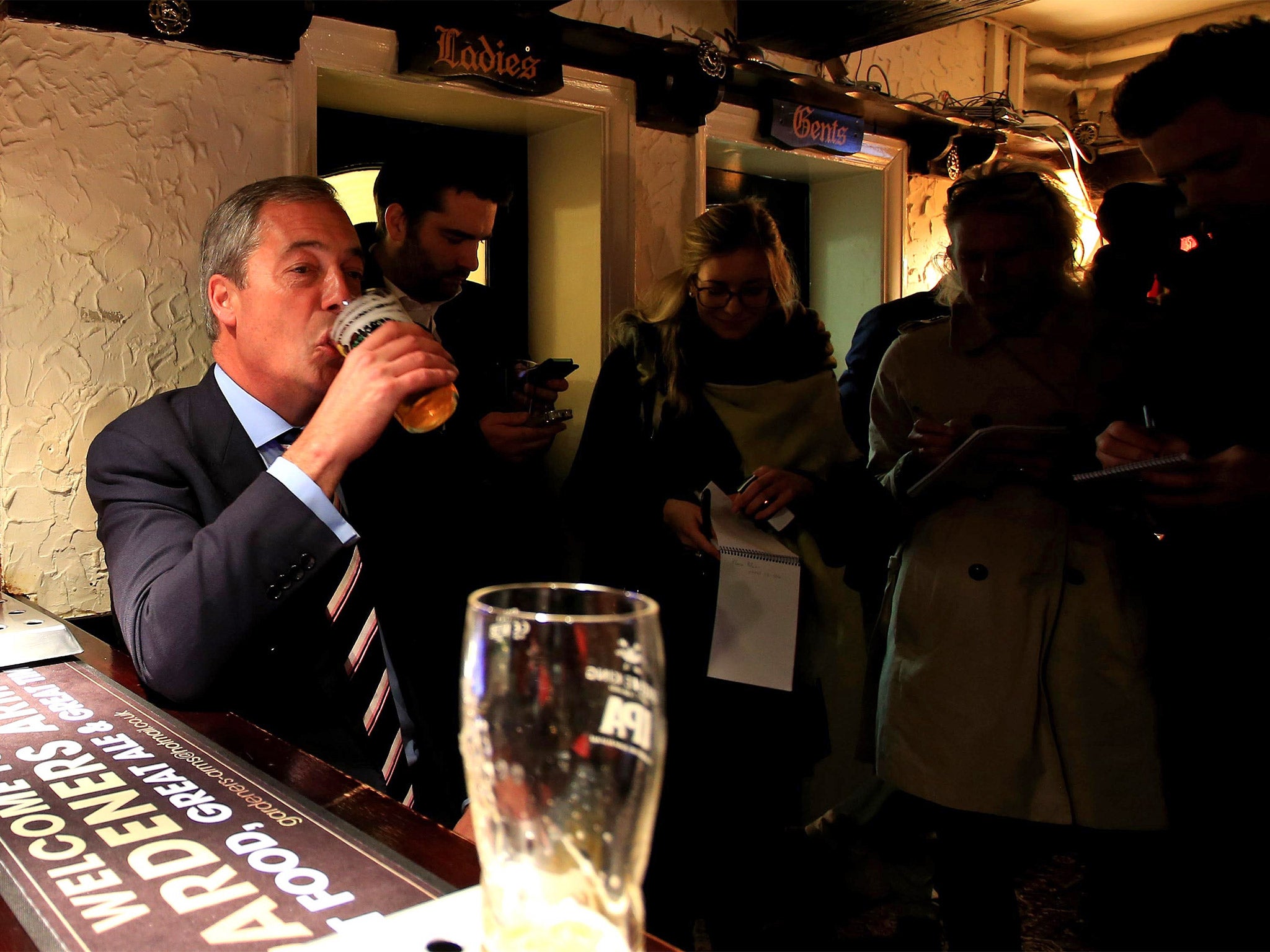 The Ukip leader enjoys a pint with locals