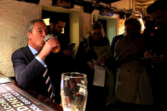 The Ukip leader enjoys a pint with locals