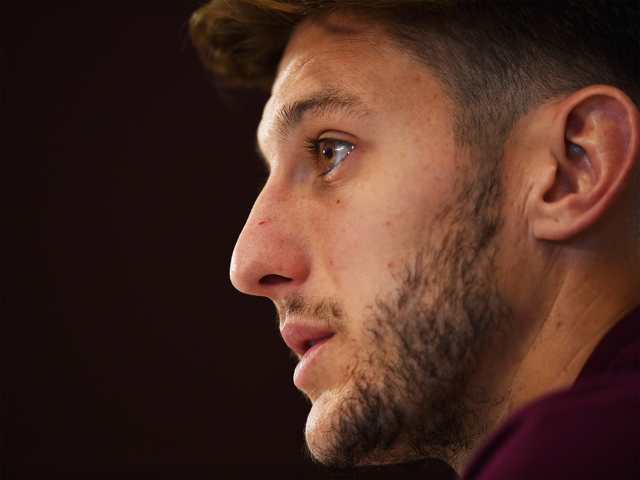 Adam Lallana faces the media at St Georges Park