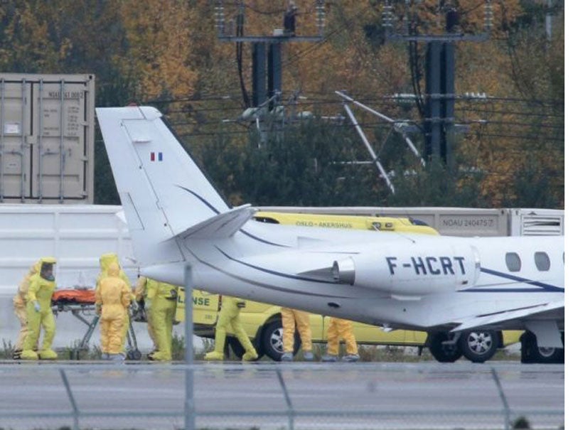 A Norwegian woman infected with the Ebola virus in Sierra Leone arriving at Oslo airport on 7 October