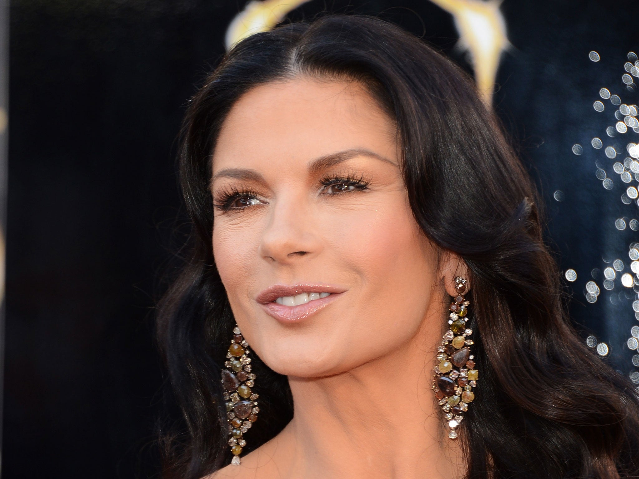 Catherine Zeta Jones will play a glamourous journalist in the film remake of Dad's Army