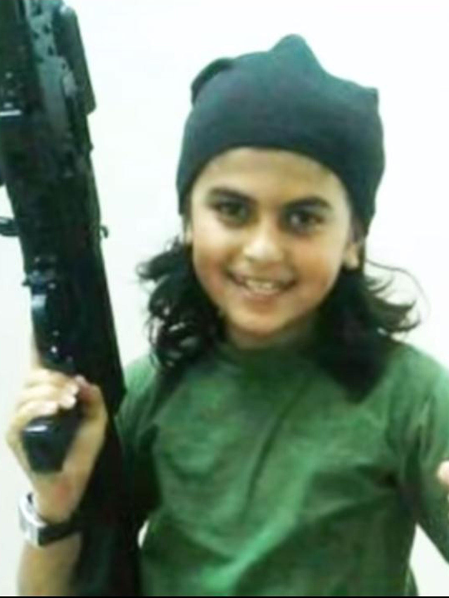 Isis supporters are circulating images of a child who they say has become the youngest to be killed in battle while fighting for the extremist group