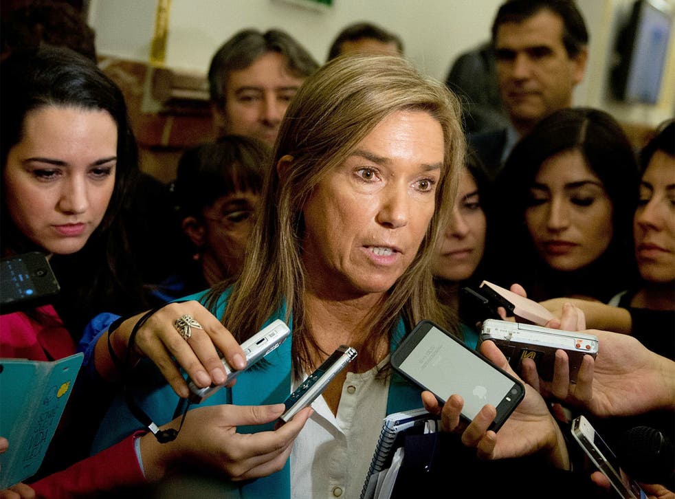 Spanish Health Minister Ana Mato answers questions from the media